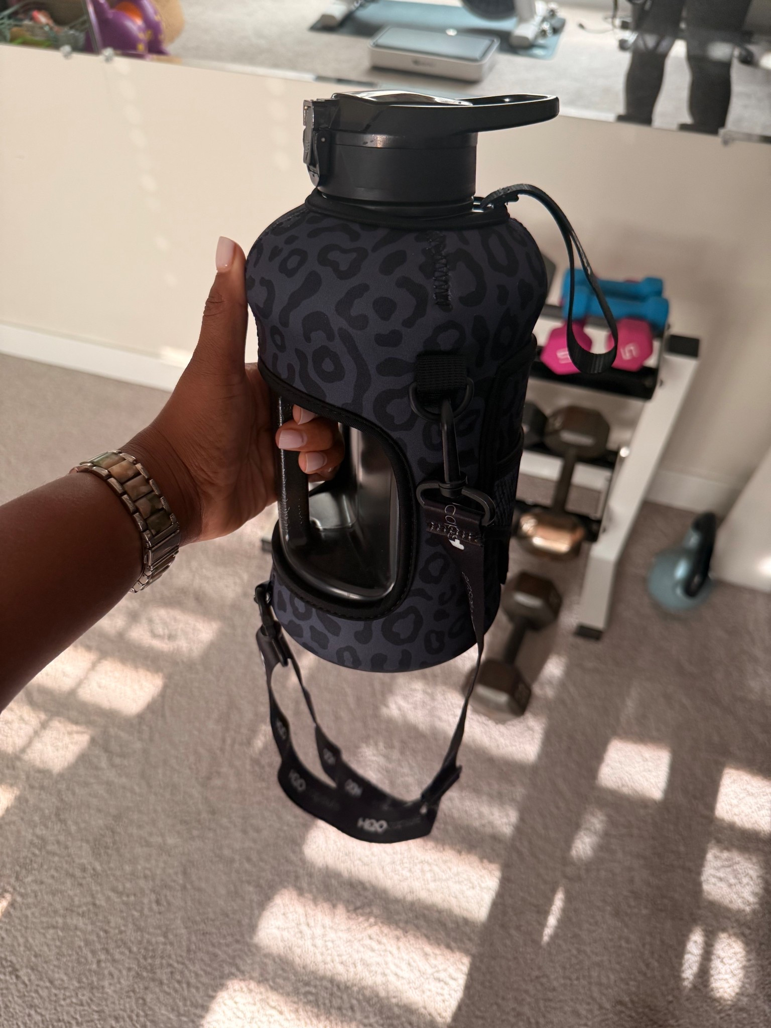 New leopard print water bottle that has a strap on it so I can carry it around with me. 