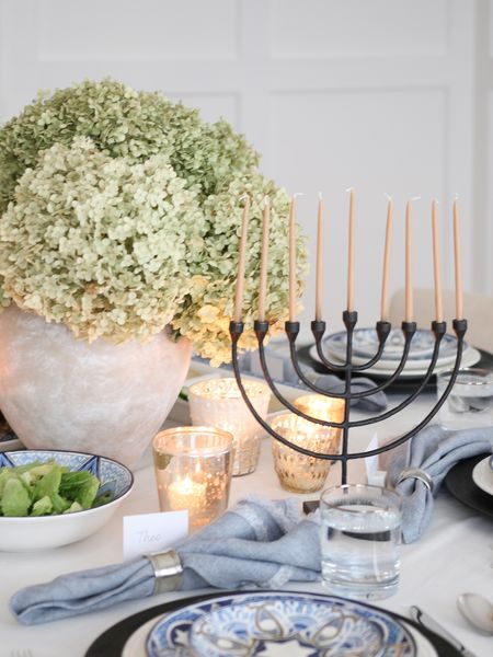 Hanukkah table setting, menorah, hanukkah plates, Mercury glass votive candle holder, menorah candles, pottery barn 

#LTKHoliday #LTKhome #LTKSeasonal