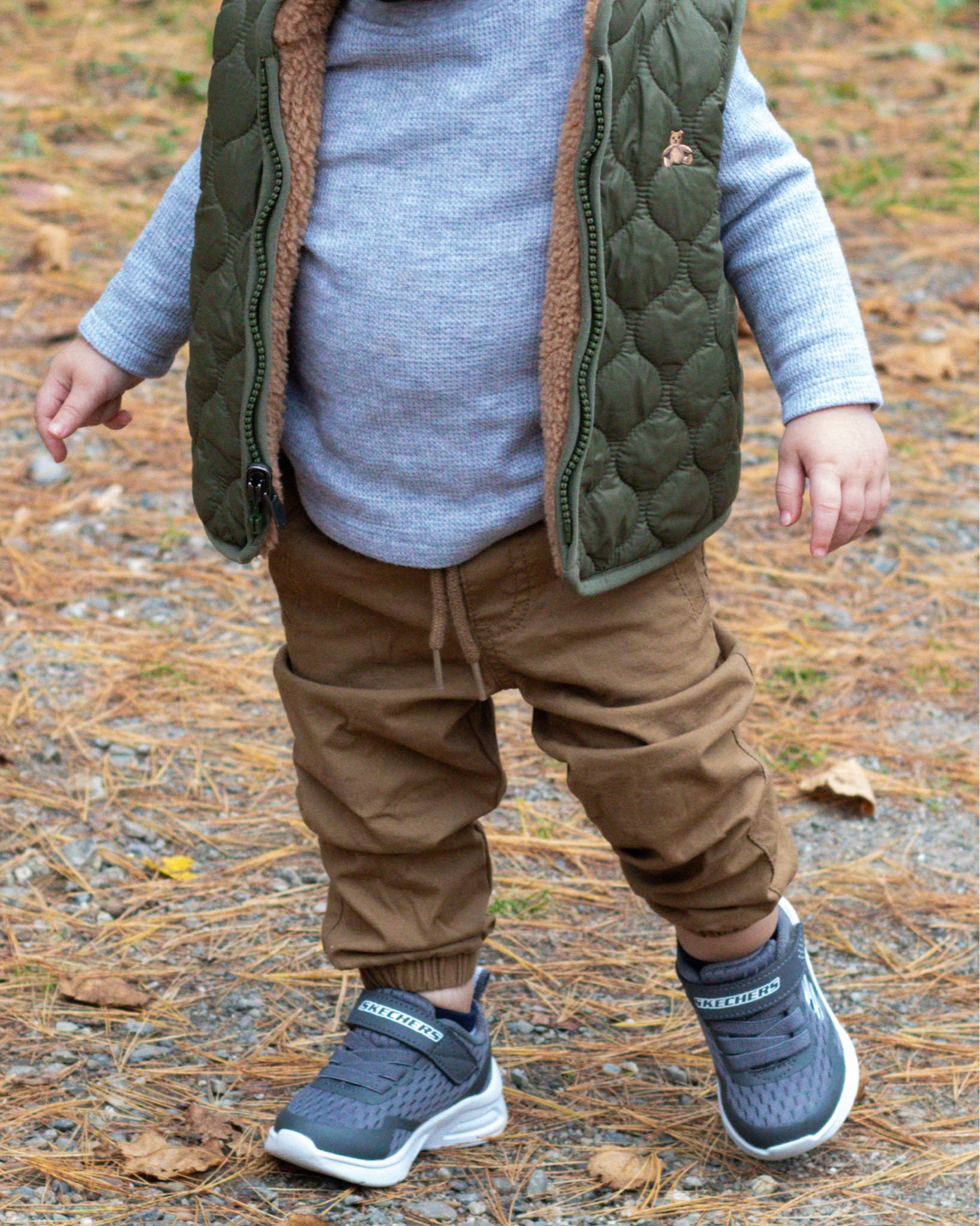 I mean, how adorable is this little outfit?! 
We LOVE these chino joggers. Casual enough to wear for play during the day without being uncomfortable, but yet still “dress up” enough not to look like pj pants. And they have a functional drawstring so if your toddler is between sizes (like Shepherd is!) it offers a more custom fit. Oh ya. And they’re 50% off. 

His cute little waffle long sleeve tee is on sale too- we have these in every color and they’re the perfect basic! 

Toddler outfit. Toddler boy clothes. Fall outfits for toddler boys. Neutral boy clothes. Basic toddler clothes. Apple picking outfit for kids 

#LTKstyletip #LTKfamily #LTKkids