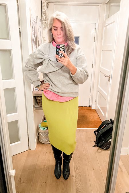Ootd - Wednesday. The cutest bow sweatshirt, a pink button down shirt, a lime green rib knitted midi skirt and black tall boots. 



#LTKworkwear #LTKeurope #LTKstyletip