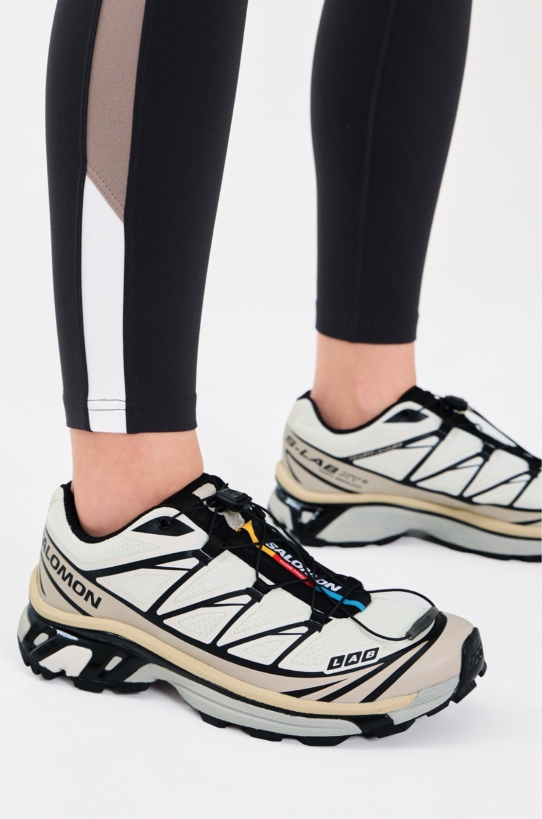 New color in these Salomon sneakers! Go down 1/2 size