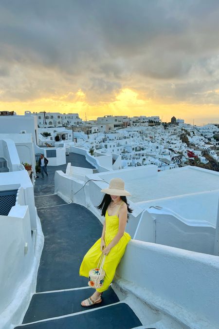 I was in Santorini this time last year. It was relatively cool so I was able to pack all my summer clothes! I wore this yellow midi dress with my calf hair leopard spotted sandals, a floppy hat, and straw bag.

#LTKeurope #LTKxMadewell #LTKSeasonal