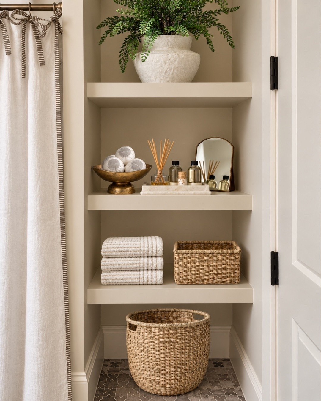 A beautiful way to style bathroom shelves - I love these baskets for additional storage, and these warm brass accessories add a level of sophistication to any bathroom, 

Bathroom, bath, bathroom decor, bathroom ideas, bathroom decor, bathroom accessories, bathroom design, pottery barn, McGee and co, west elm