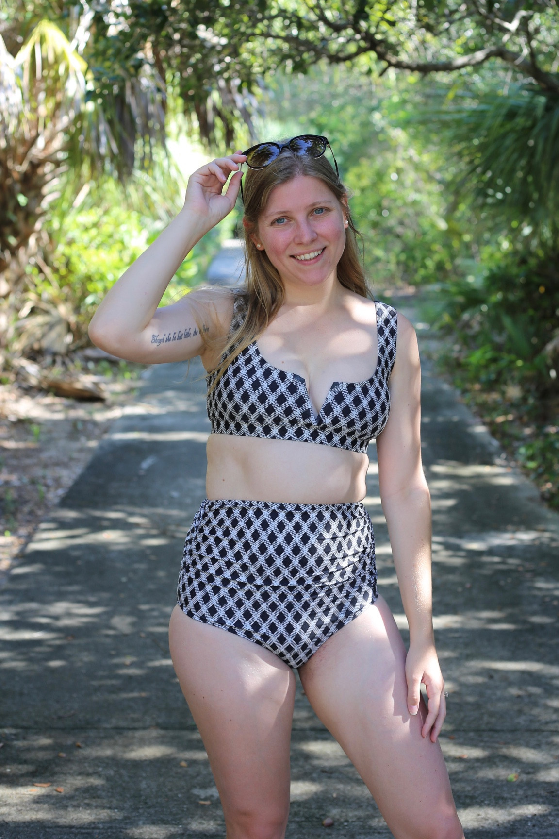 Use code SUMMERDANIELLE for 10% off. Suits run TTS. 

High waist ruched bikini bottom in black and white diamond check. Subtle cleavage bikini top. 

#LTKSwim