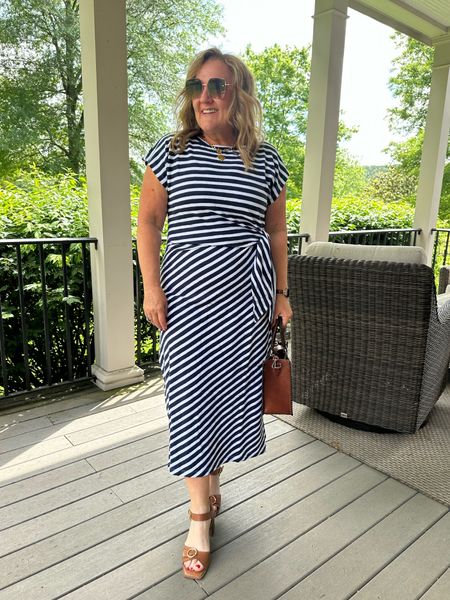 This is a great tshirt dress. The fabric is like a rugby shirt weight. Remember those?

I’m wearing a size large regular. 

Loft striped dress Memorial Day dress summer dress graduation dress navy and white 

#LTKFindsUnder50 #LTKMidsize #LTKOver40