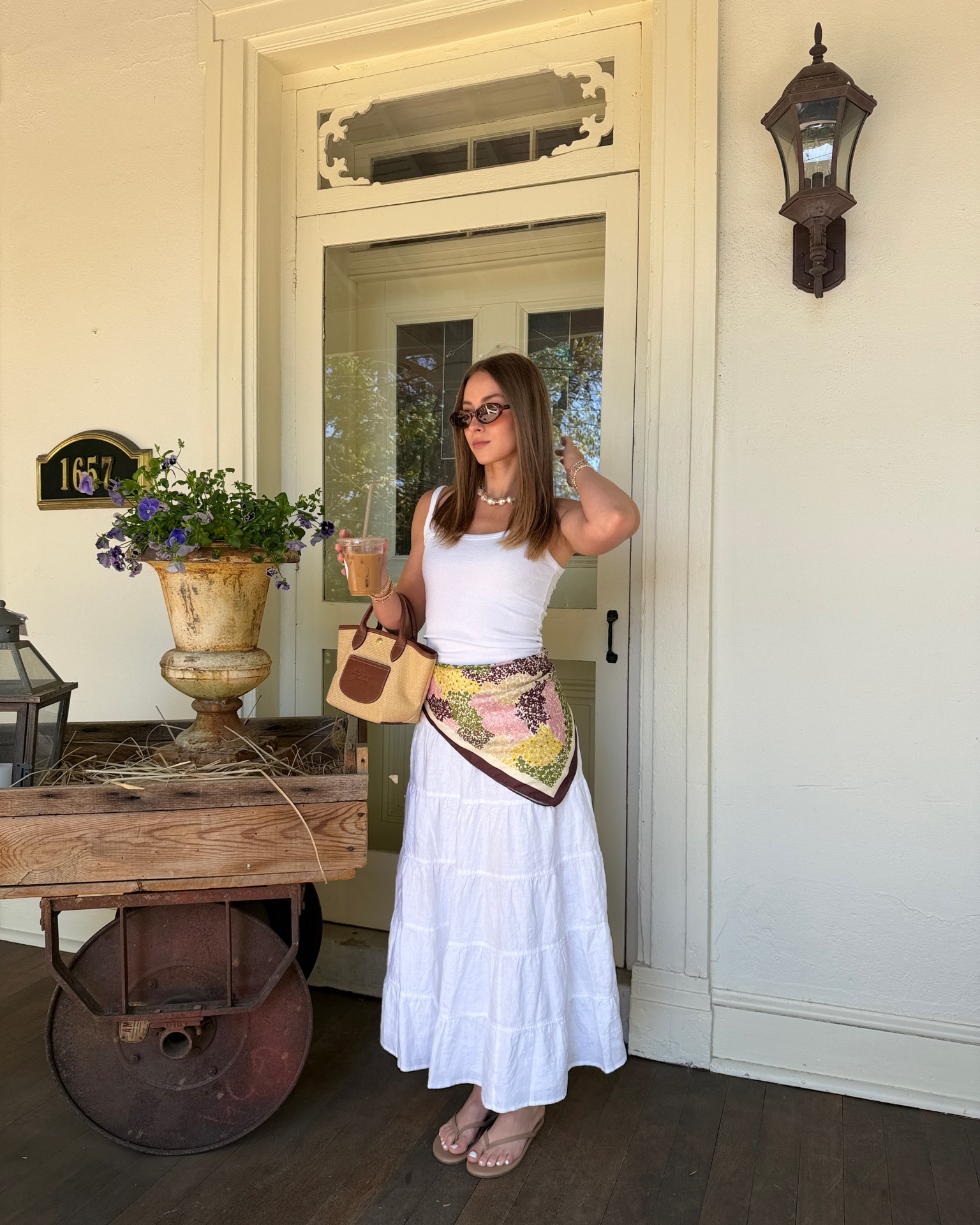 5/5/26 Casual Summer Outfit with Flowy Skirt An easy summer outfit I’ll be wearing on repeat 🤍 my Aritzia flowy white skirt with my favorite tank, styled with a Mango scarf and pearl necklace from J.Crew. Finished with Aire sunglasses, my Longchamp bag, and TKEES flip flops—everything is linked here

#LTKootd #LTKSeasonal

#LTKootd #LTKSeasonal