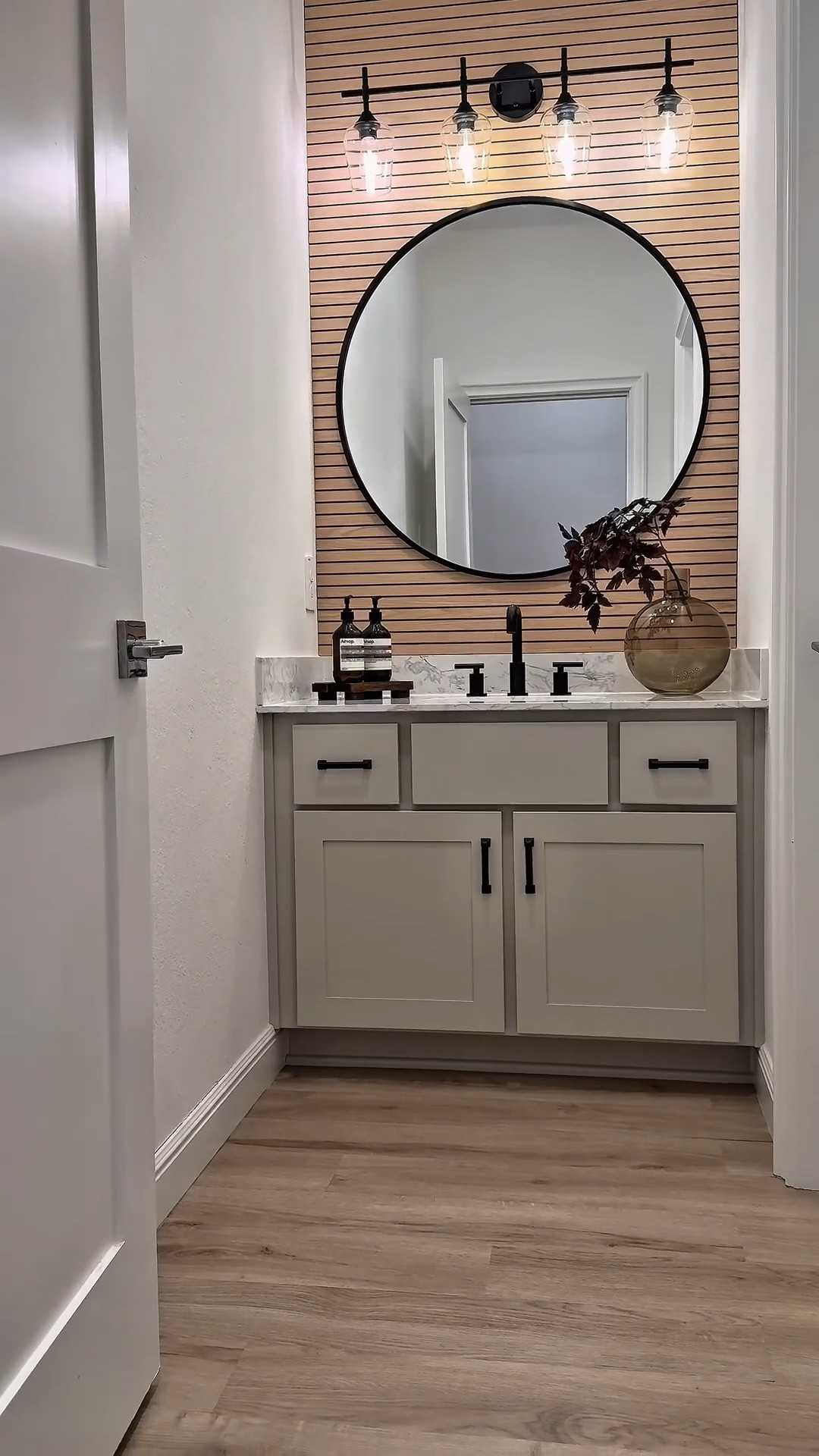 These peel and stick panels are such a game changer. 🥰 They come in different colors and are super easy to cut and install. 🤎 I went with Natural Oak here and I love how it completely transformed the space. Thinking the next step might be to color drench the room in matte black. 

Items are linked for easy shopping—just click the link to shop!

#LTKHome #LTKStyleTip #LTKSaleAlert