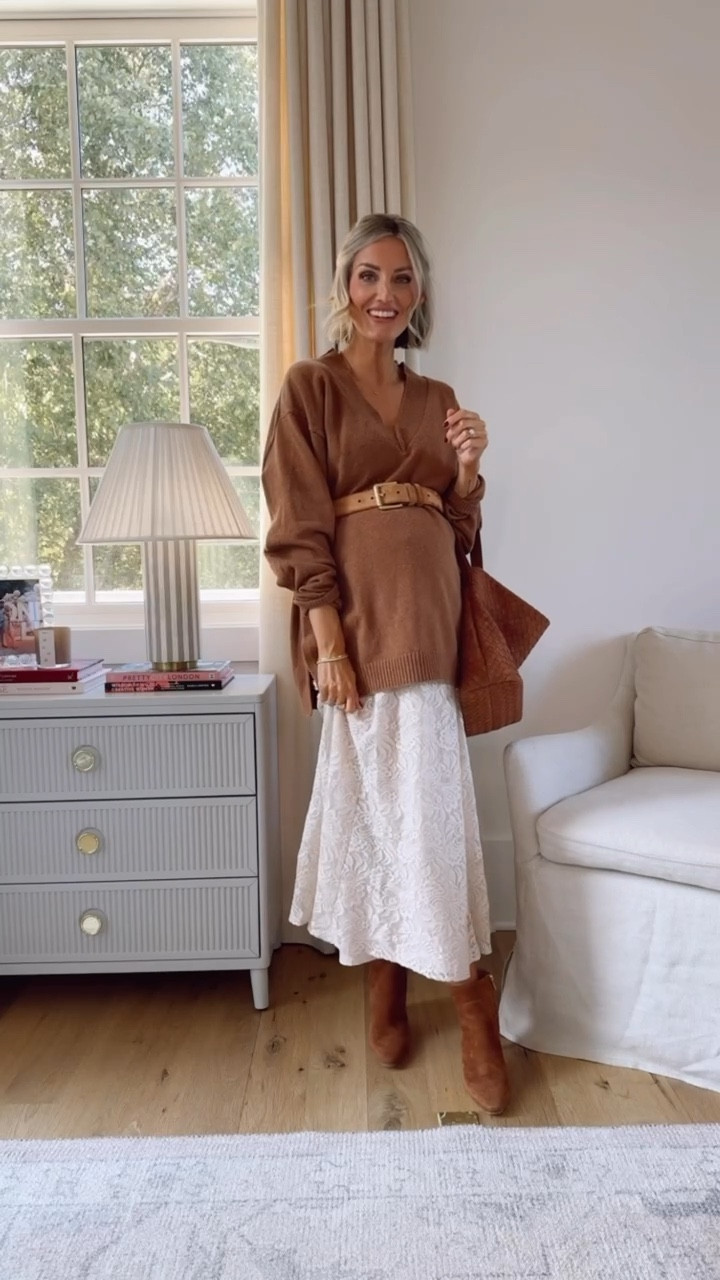 This rust sweater is very oversized, which works great with a bump! I did add a belt to cinch it in though, but this would be a great sweater to wear with leggings! Love it with this lace white maxi skirt! Wearing XS in top & size 2 in skirt!

Loverly Grey, Thanksgiving outfit, fall sweater, lace skirt, maxi skirt, booties, maternity 

#LTKStyleTip #LTKSeasonal
