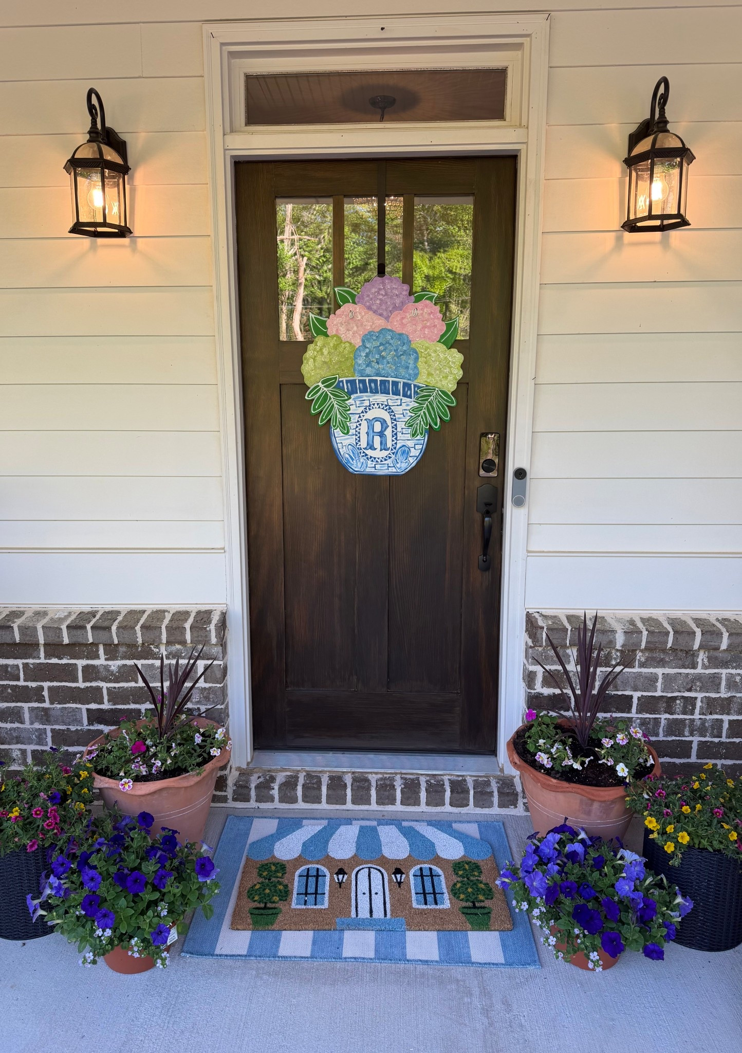 Hello spring 🌿 Front porch refresh in under 60 seconds. I mixed Amazon, Walmart, and Target to create a cozy little spot with rocking chairs, fresh florals, and all the blue details that just feel like the season. Even linked my outfit… because you know I can’t help myself. Everything is linked in LTK. Save this for when you’re ready to refresh your own porch. Comment PORCH for links. 

Spring Home, front porch, spring decor 

#LTKdayinmylife #LTKmomlife #LTKootd
