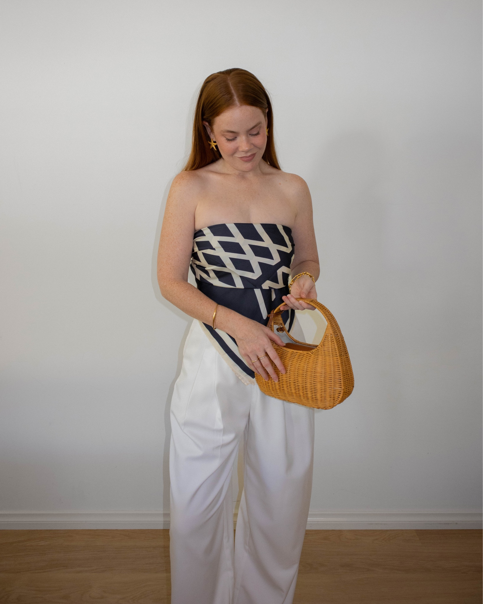 A silk scarf turned into a top (such a versatile piece!), classic white pants and wicker accessories.

I’m wearing a size 8 in the white DISSH pants.