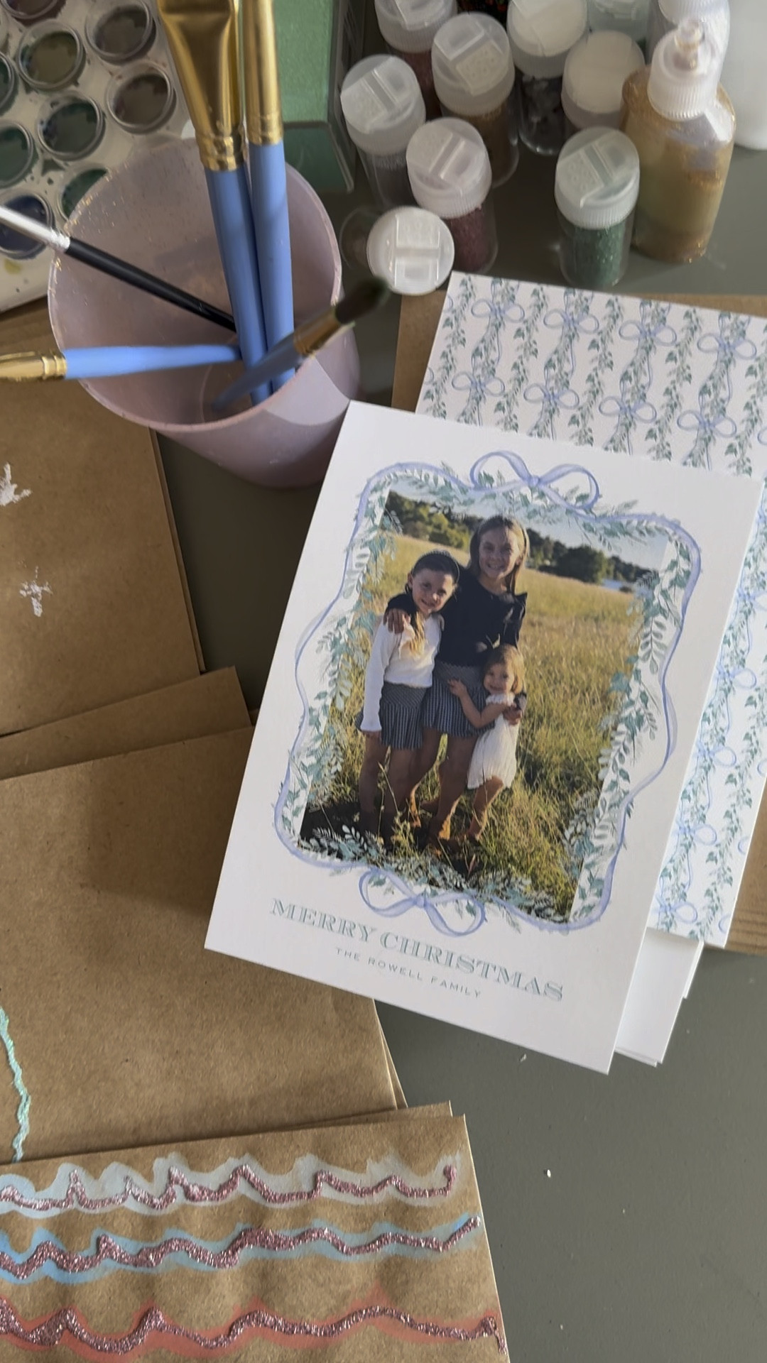 This year’s $12.00 Christmas cards might just be my favorite. I ordered an Etsy template and had these printed at our local printer. I bought a bunch of Kraft envelopes, glitter glue and glitter and let my girls have fun turning every envelope into a little piece of art 🩵💚💙

#LTKHoliday #LTKSeasonal #LTKCyberWeek