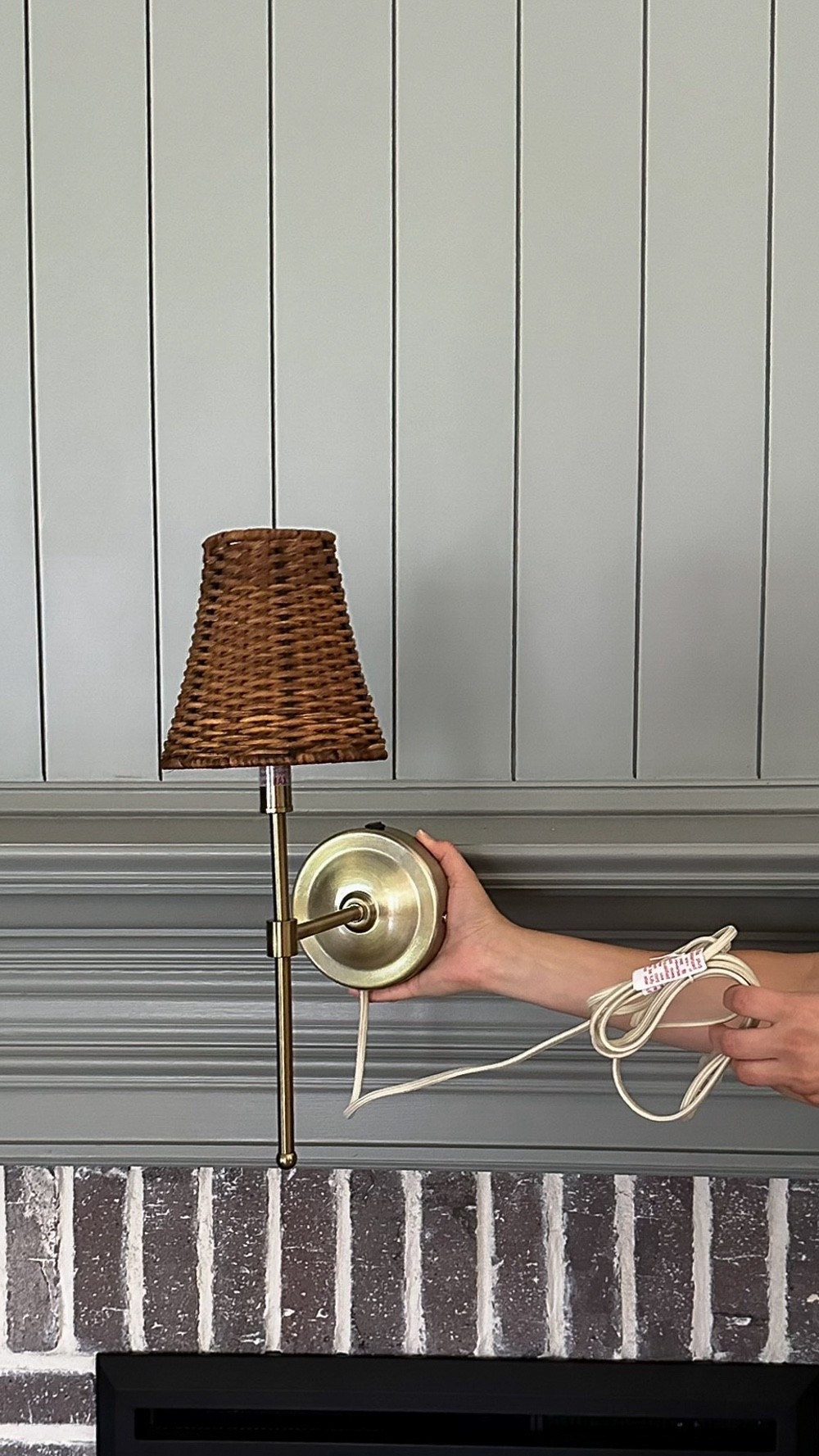 Rattan shade brass plug in wall sconces from Magnolia for above my fireplace. Magnolia is having at 25% off sale for Labor Day!

#LTKHome #LTKStyleTip #LTKSaleAlert