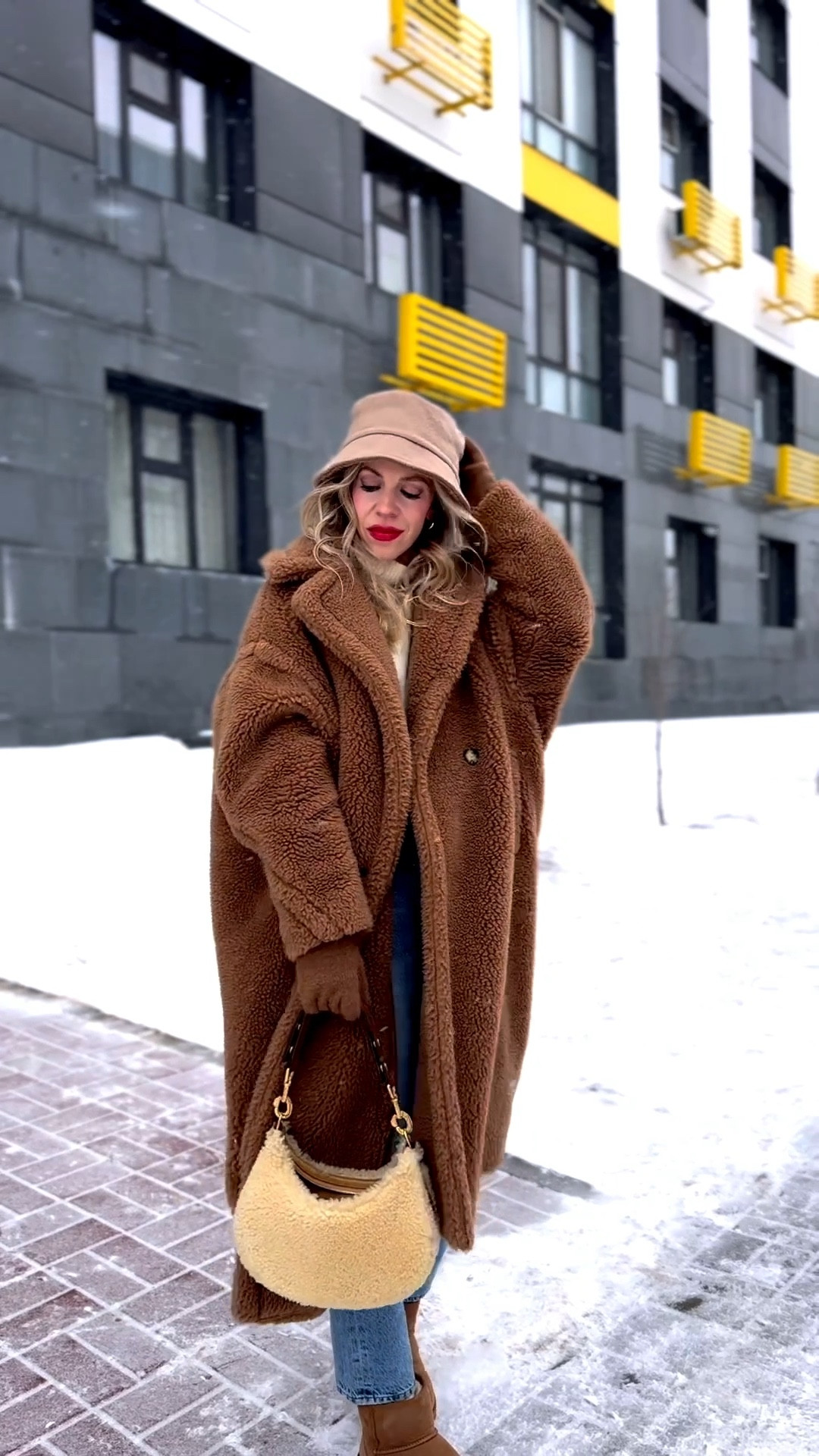 Teddy coat winter outfit, shearling fur bucket hat, Max Mara coat, AGOLDE slim straight leg jeans, Ugg mini boots, shearling handbag, cozy winter style 

#LTKSaleAlert #LTKOver40 #LTKSeasonal
