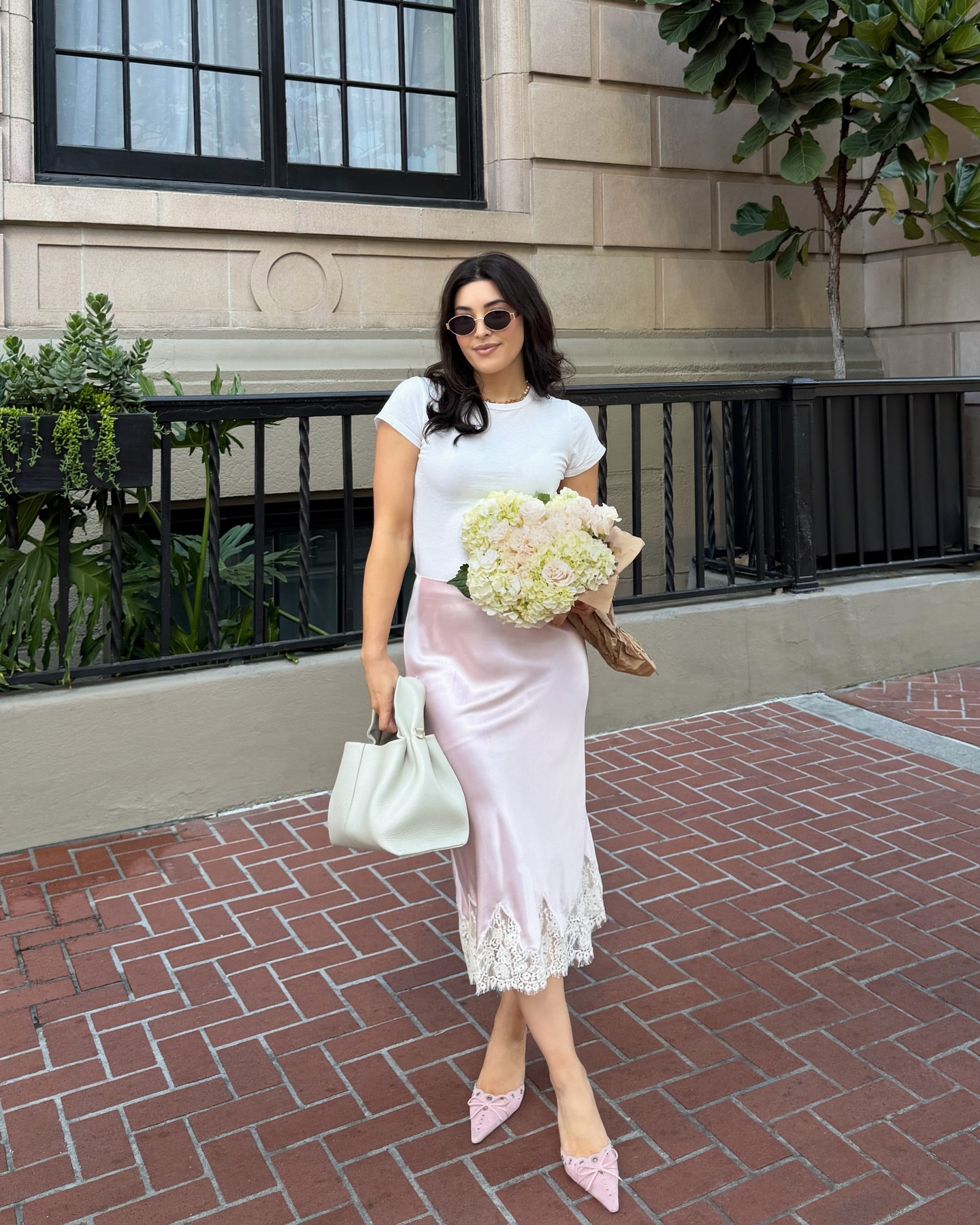 Feels like spring 💐 
Reformation Carolina skirt in baby pink midi skirt with lace at the bottom! 
@reformation #ltkspring 

#LTKmorningroutine #LTKWorkwear