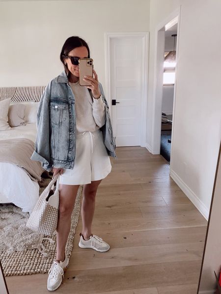 Outfit from April’s capsule wardrobe 
Double soft white shorts- recommend sizing down 
Oatmeal sweatshirt- tts 
Oversized denim jacket 

#LTKstyletip