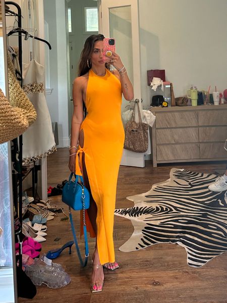Absolutely obsessed with this dress. It’s $295. You can get exact color directly from Simon Miller! but linked the black option here 