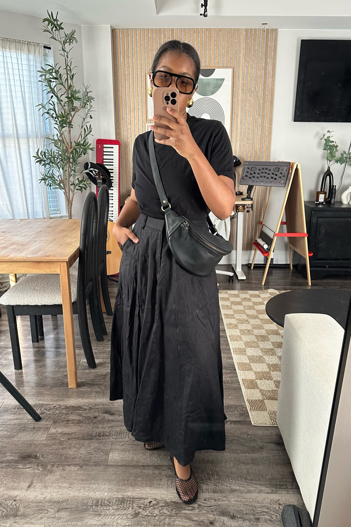 Black midi circle skirt, black t-shirt, mesh ballet flats, casual minimalist outfit 

#LTKFindsUnder100 #LTKStyleTip #LTKShoeCrush