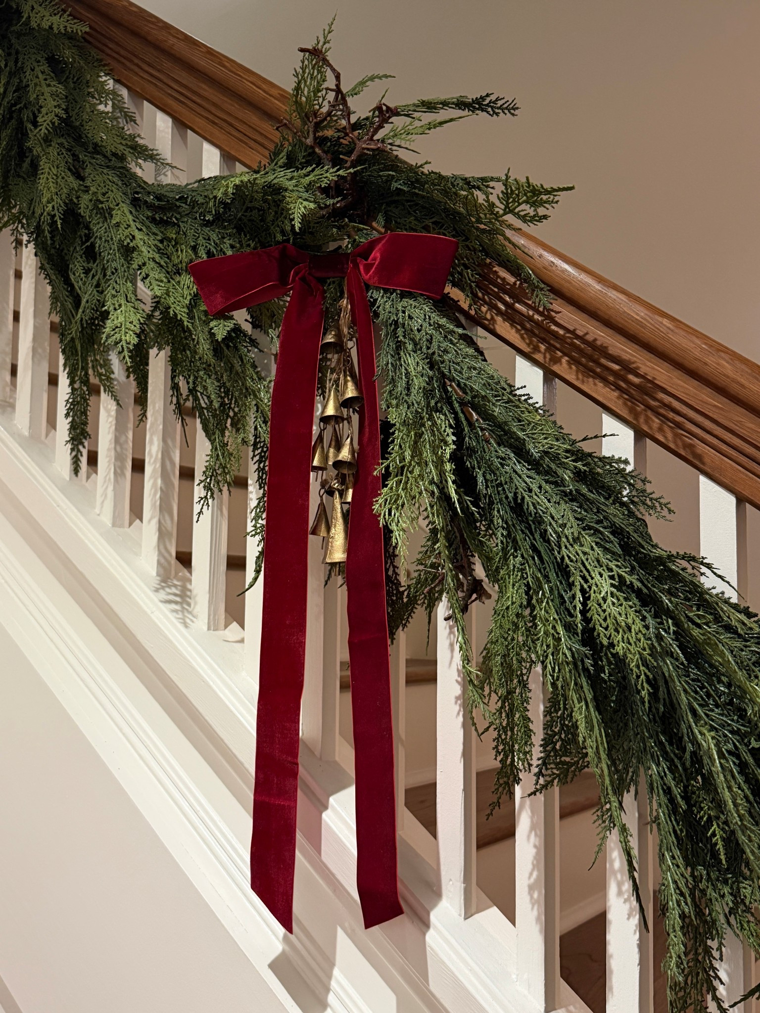 Bows, bells, and garland 

#LTKHoliday #LTKHome #LTKSeasonal