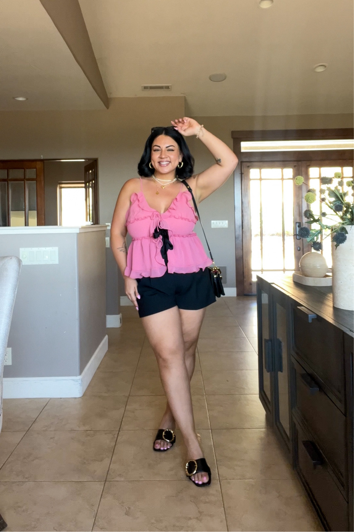 wearing a size 14 in the shorts
size xl in the camisole
aritzia runs a half size small in my opinion! 

#LTKMidsize #LTKWorkwear #LTKStyleTip
