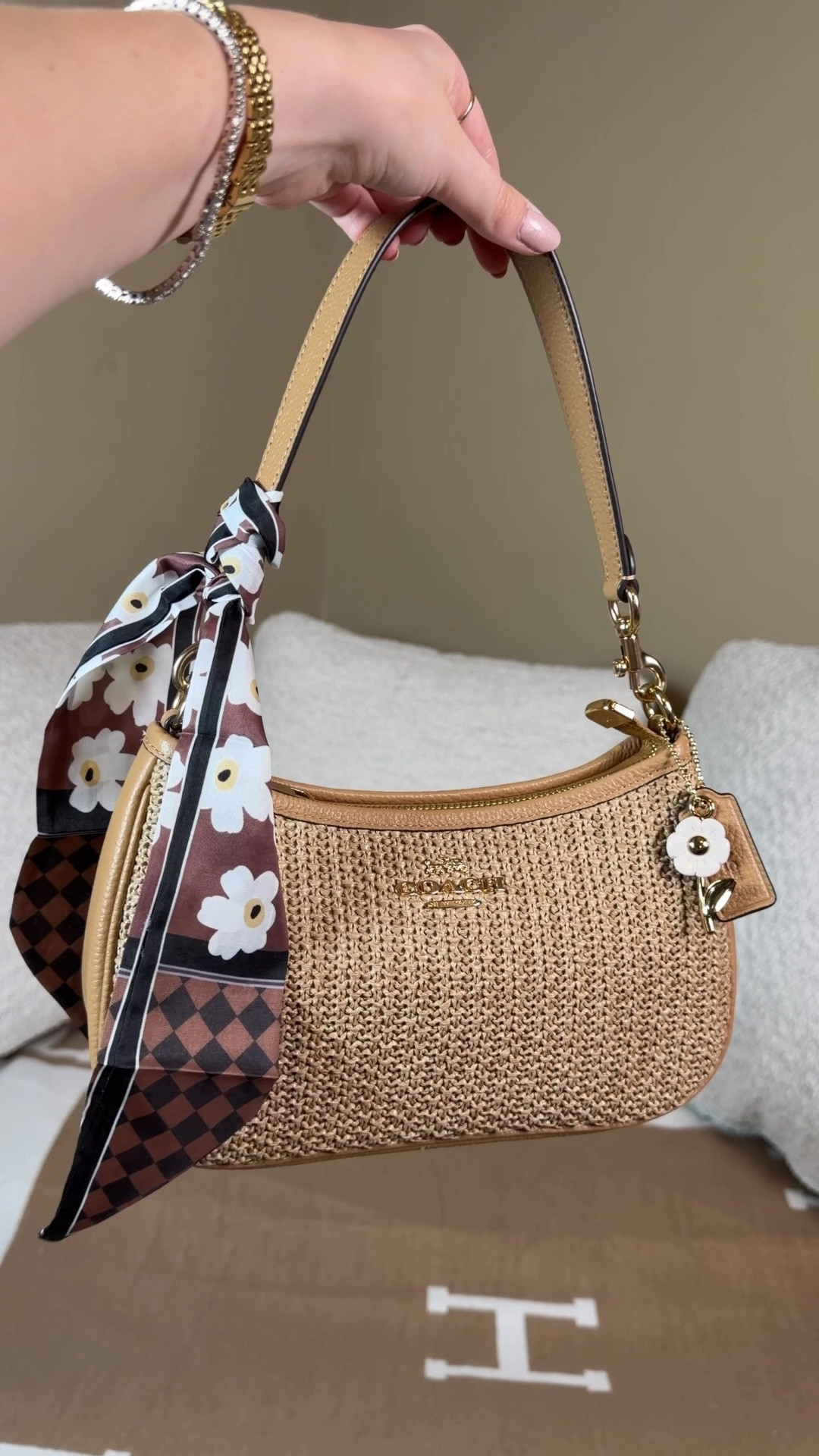 What fits in the Coach outlet raffia Teri 🌸 Comment SHOP & I’ll dm you the link 🌸
This is the perfect summer bag! The tan with the raffia texture is such a staple for your summer wardrobe, I even found an insert made for it! I love the flower charm in Cole’s with 

What’s in my bag:
Coach Teri bag insert
Mini Longchamp inspired coin pouch
Tom ford mini lipstick (my fave lipstick ever)!
Hair oil perfume
Touchland hand sanitizer
Gucci pill bottle (can’t link but it’s from Zitomer)! 
Silicone phone case lip gloss holder is form TikTok shop but I linked similar ones


#LTKgrwm #LTKdayinmylife #LTKootd