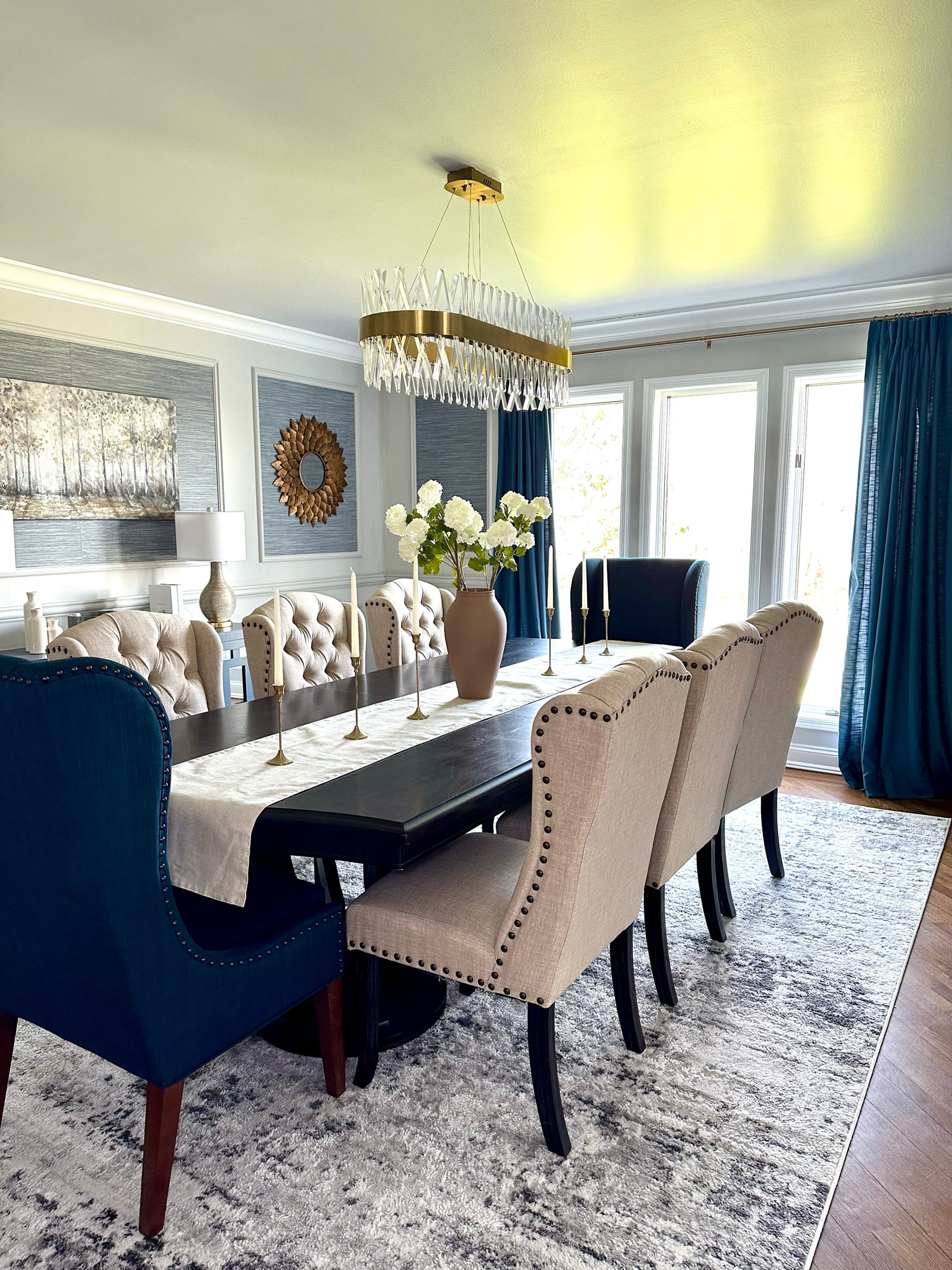 Dining room spring refresh. Dining room chairs. Formal dining room. Dining room table. Curtains. Decorative vase. Spring florals. Snowballs. Faux spring florals. Chandelier. Runner. Rug. Faux florals.

#LTKSeasonal #LTKhome #LTKstyletip