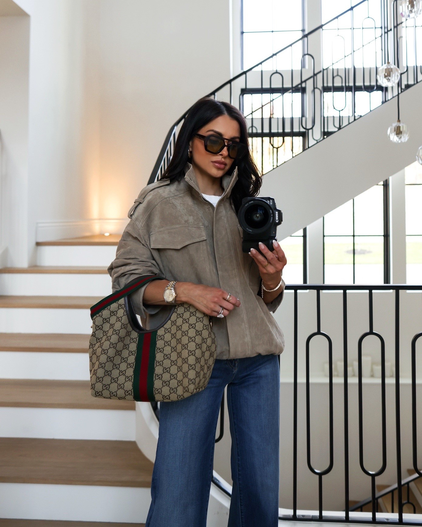 Amazon suede bomber jacket that gives a true luxe look for less. The soft suede texture and structured silhouette make it the perfect spring layer, instantly elevating even the simplest denim outfit. Styled with my favorite jeans for that flattering, elongating fit and finished with chic accessories for a polished, everyday look.

Amazon suede bomber jacket size XS. Mother Hustler Roller Sneak jeans size 24, runs TTS. Gucci Giglio bag size small.

miamiamine amazon suede bomber jacket luxe look for less spring layering piece mother hustler roller sneak jeans elevated denim outfits gucci giglio bag designer inspired sunglasses chic everyday style minimalist wardrobe staples polished casual fashion

#LTKootd #LTKOver40 #LTKPetite