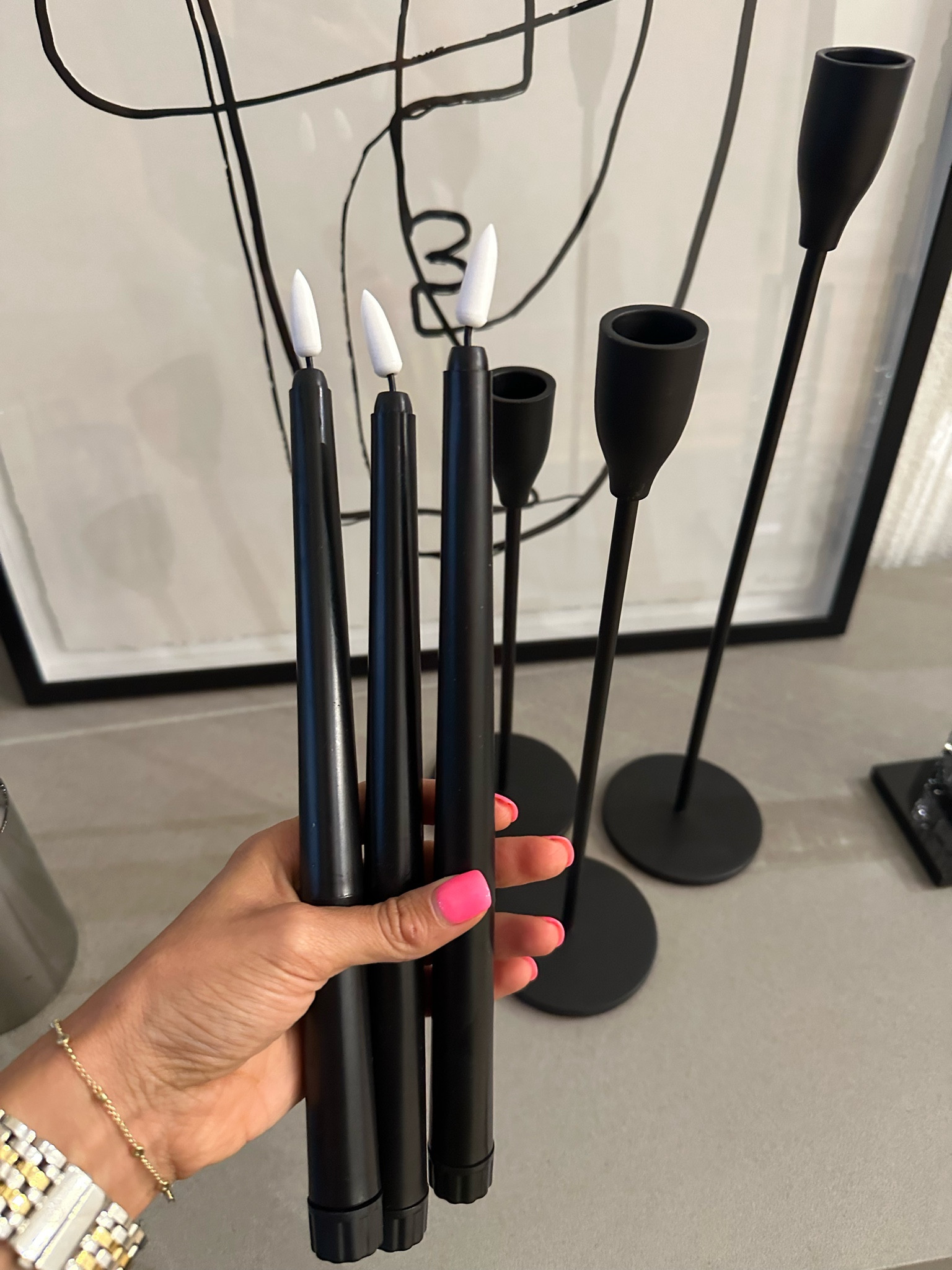 Moving frameless candles and black candlesticks mantle fireplace home decor 

#LTKhome #LTKunder100 #LTKunder50