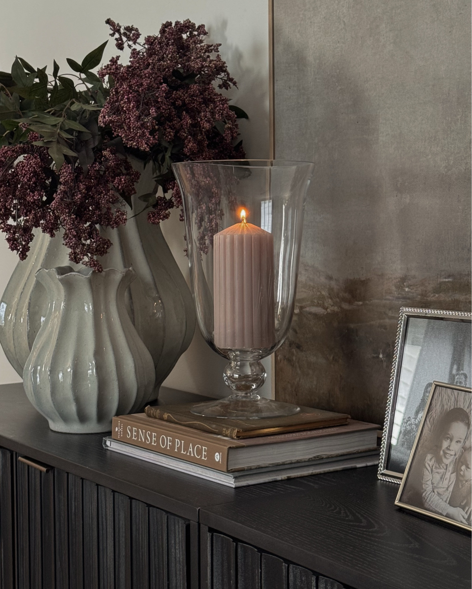 Sideboard decor, sideboard styling, console table decor, canvas wall art, table lamp, spring stems, spring vase, candle holder, console table, sideboard, living room decor, entryway decor ￼

#LTKHome #LTKSeasonal