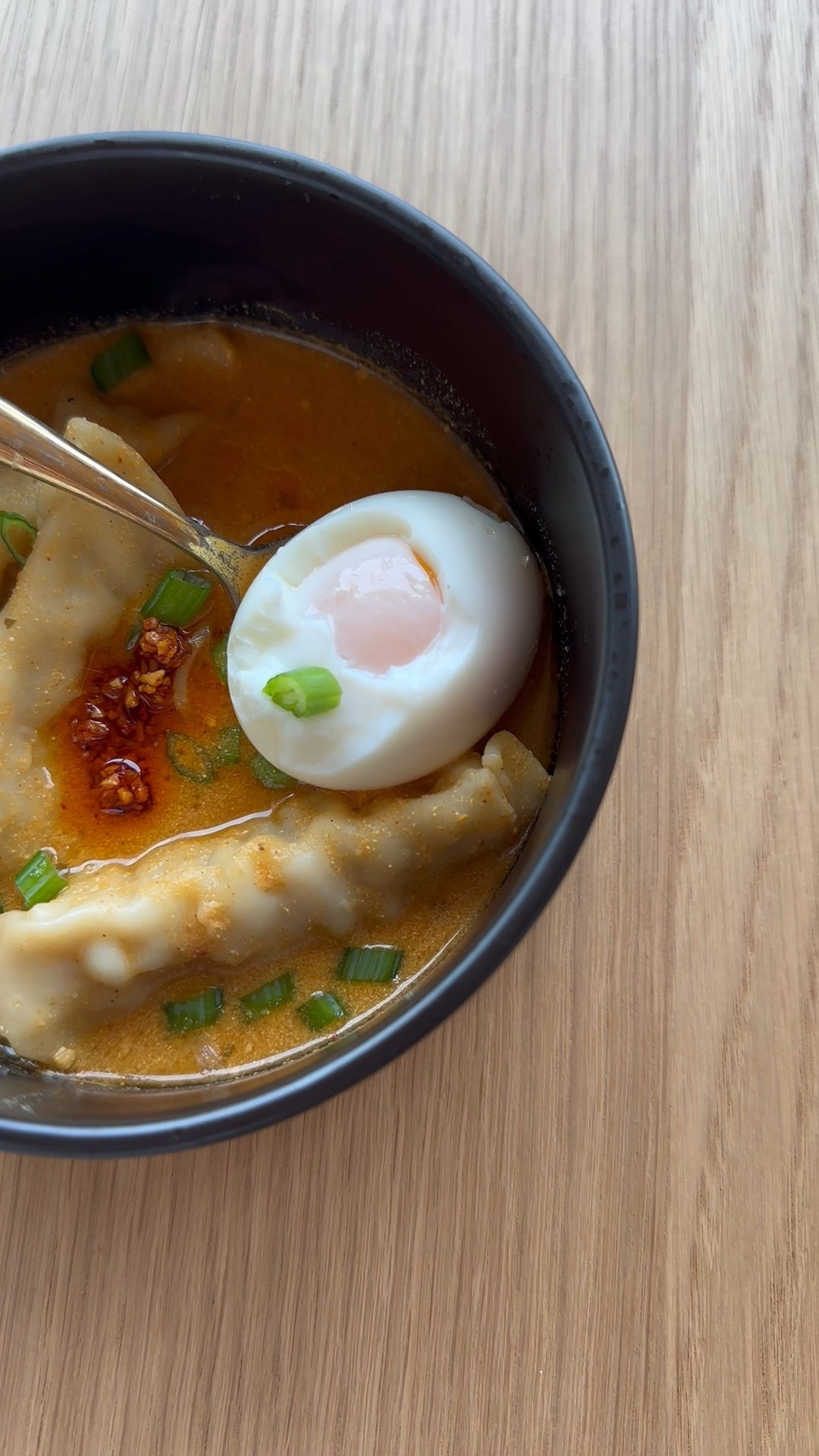 Quick N Easy High Protein Lunch Idea 

🧡Thai Dumpling Soup 🧡

I bought chicken and vegetable potstickers from Target. Cook according to package and set to the side until you are ready to place them in broth. 

For the soup part in my mini chopper (you could use a blender)  I mixed👇🏽
•5 oz cottage cheese 
•Squeeze of ginger paste 
•3 cloves garlic 
•Squeeze of Seoul gochujang paste 
•Splash of tamari 
•2-3 tablespoon of momofuku chili crunch 
•Juice from one lime 
•Splash of milk 
•1 tablespoon blue dragon red curry sauce 
• Spices > Himalayan pink sea salt, turmeric, spice house black garlic ramen pepper, curry powder, lemongrass 

Blend that all together and then in a medium saucepan mix that with fire and kettle chicken bone broth (I used half a carton of 16.9 oz) 

Once simmering add potstickers and top with green onion and more chili crunch. 

I also paired the soup with a medium hard boiled egg. 



#LTKfoodie #LTKvlog #LTKdayinmylife