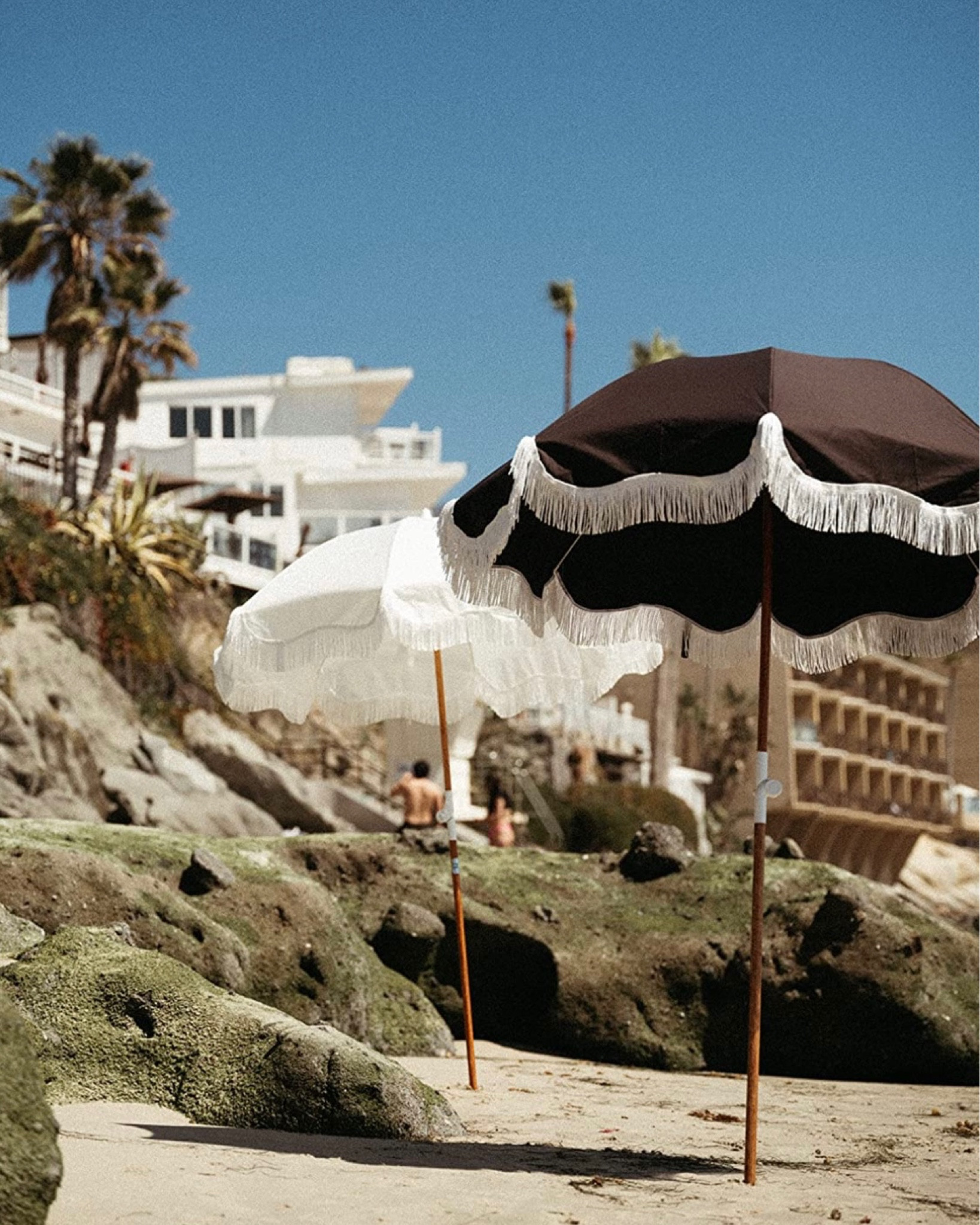 Tassel fringe umbrellas. Perfect for patios, decks, take to the beach, etc. I love the vintage style and it comes in several color/pattern options. Amazon home find.

#LTKFind #LTKhome