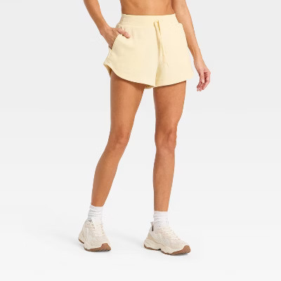 Women's Active Comfort French Terry High-Rise Shorts 2.5" - All In Motion™ Light Yellow XS | Target