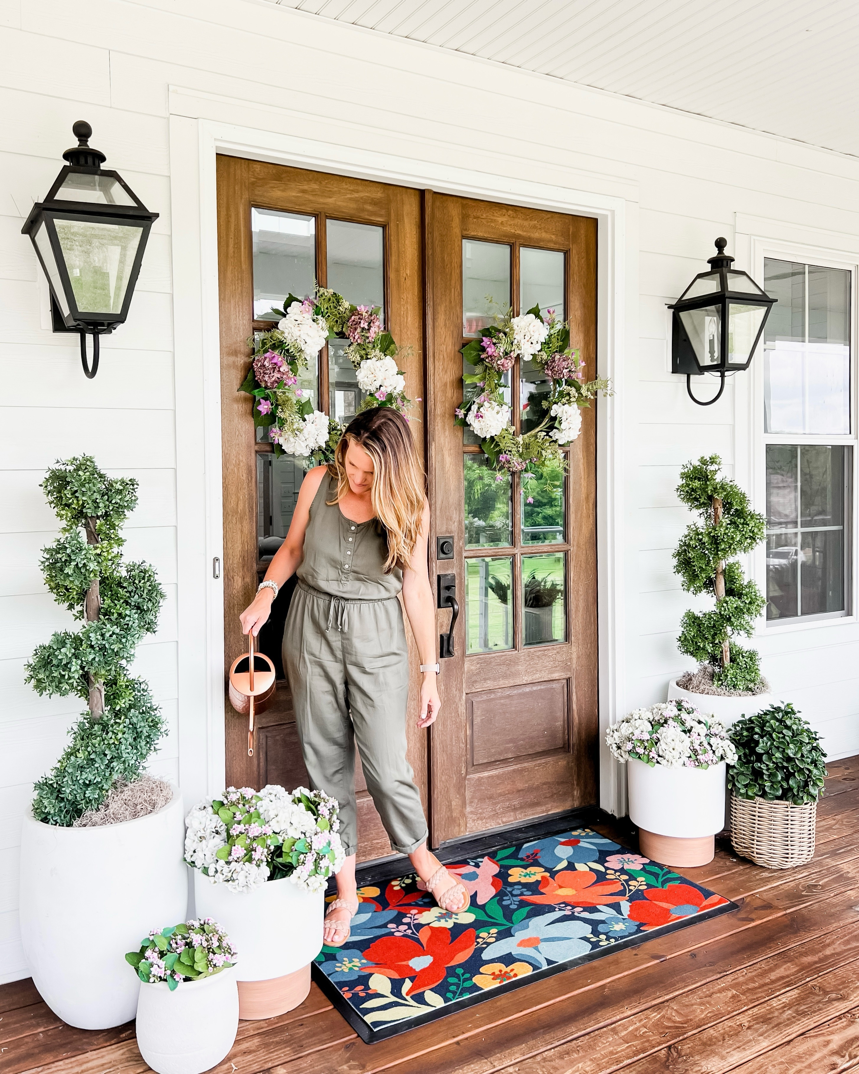 Spring is coming and here is some front porch inspiration for your doors! I love these spiral boxwood topiaries and hydrangea wreaths! The trees are on major sale right now! I can’t wait for everything to be green again! Also love this gorgeous estate doormat from Ruggable! Perfect fun pops of color for spring!

#LTKSeasonal #LTKHome #LTKSaleAlert