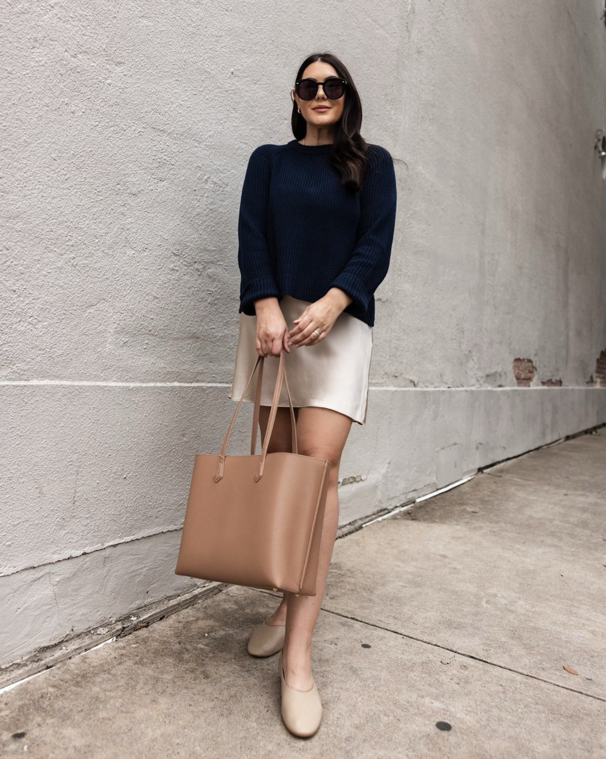 This has to be one of my favorite outfit combos for a few years running now. The juxtaposition of the fabrics is just so perfect — the chunky knit with the silky skirt. 

 I am a pretty true large across the board at Quince and this sweater is a large. It fits relaxed but defintely not oversized or too big.

I am in the large of the skirt , fit is TTS!

The flats are a steal!! TTS fit too