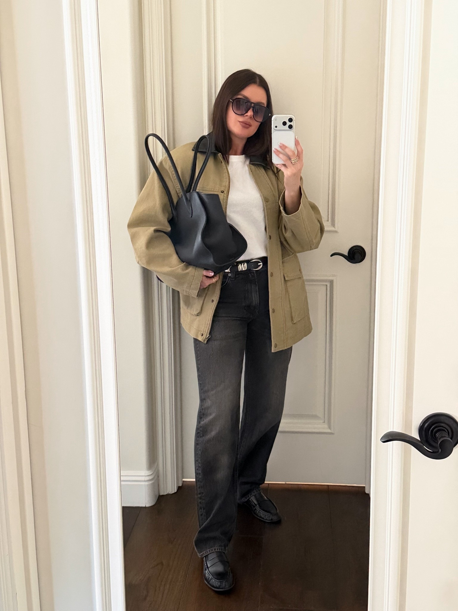 Casual fall outfit. Styling a barn jacket with black washed denim, basic tee, black leather loafers, aviator sunnier, black belt and a black leather tote. 
#barnjacket #falloutfits #casualoutfit

#LTKWorkwear #LTKootd #LTKSeasonal