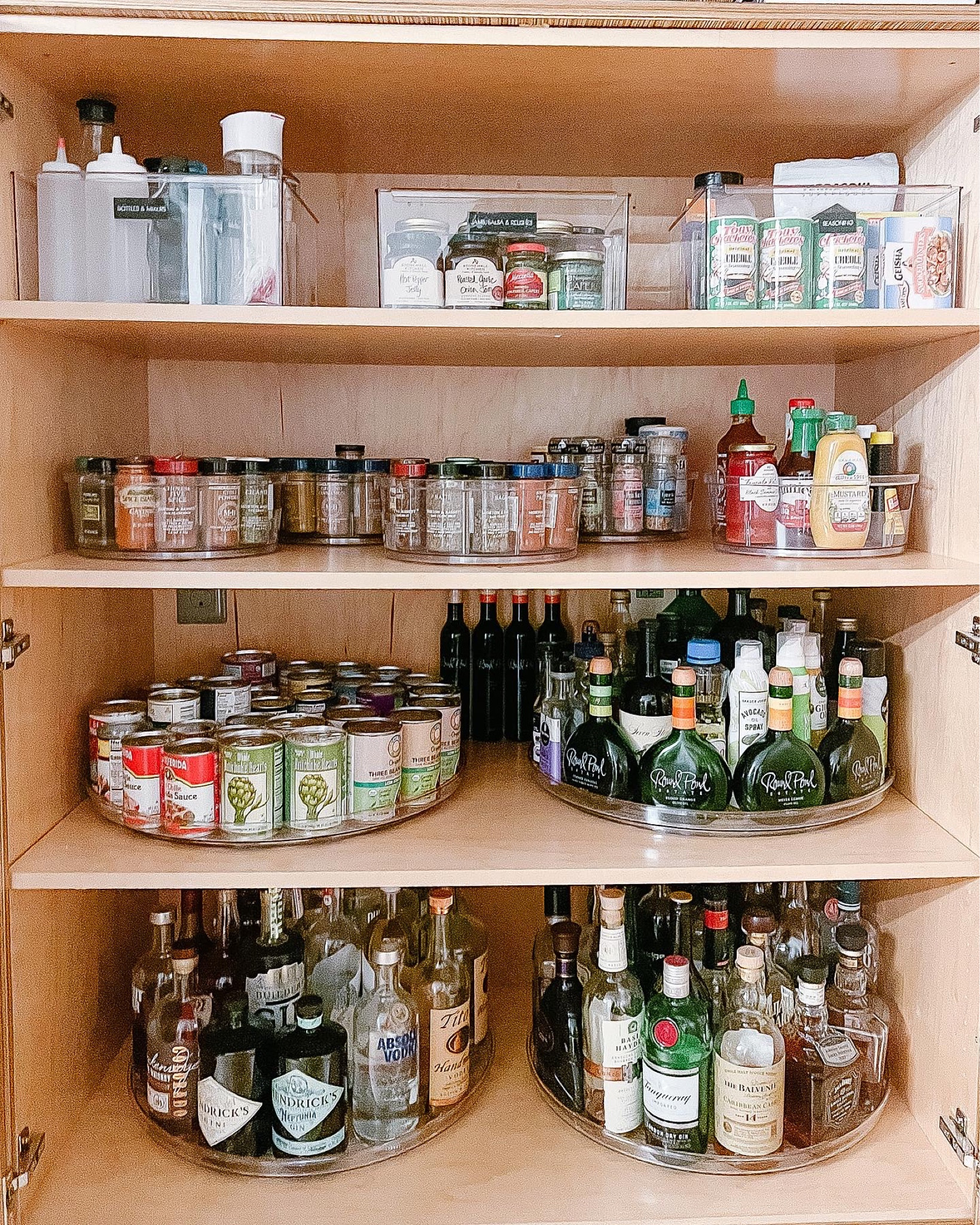 👼🏼 Welcome to turntable nirvana. 

👩🏻‍🔬 Tested out a new 20” lazy susan and it’s everything I imagined and more.  Not only great for under the sink, but amazing for corralling allllll the bottles and canned goods. They take full advantage of the space available, but ensure no canned food or bottle is left behind. 

🧂 The turn tables for the spices are some of my favorites — from target’s Brightroom collection. $15 and have walls that keep tiny spice jars in place and within view. 

💡 While these deep cabinets store a LOT, they weren’t really functioning. Spices were constantly getting knocked over and items pushed to the back were never to be seen again. Love this new setup — clients are now to totally prepared to oil up a skillet, shake up a cocktail and spice up their life! Lol🤣
.
.
.
.
.
.
.

#LTKhome #LTKunder50 #LTKfamily