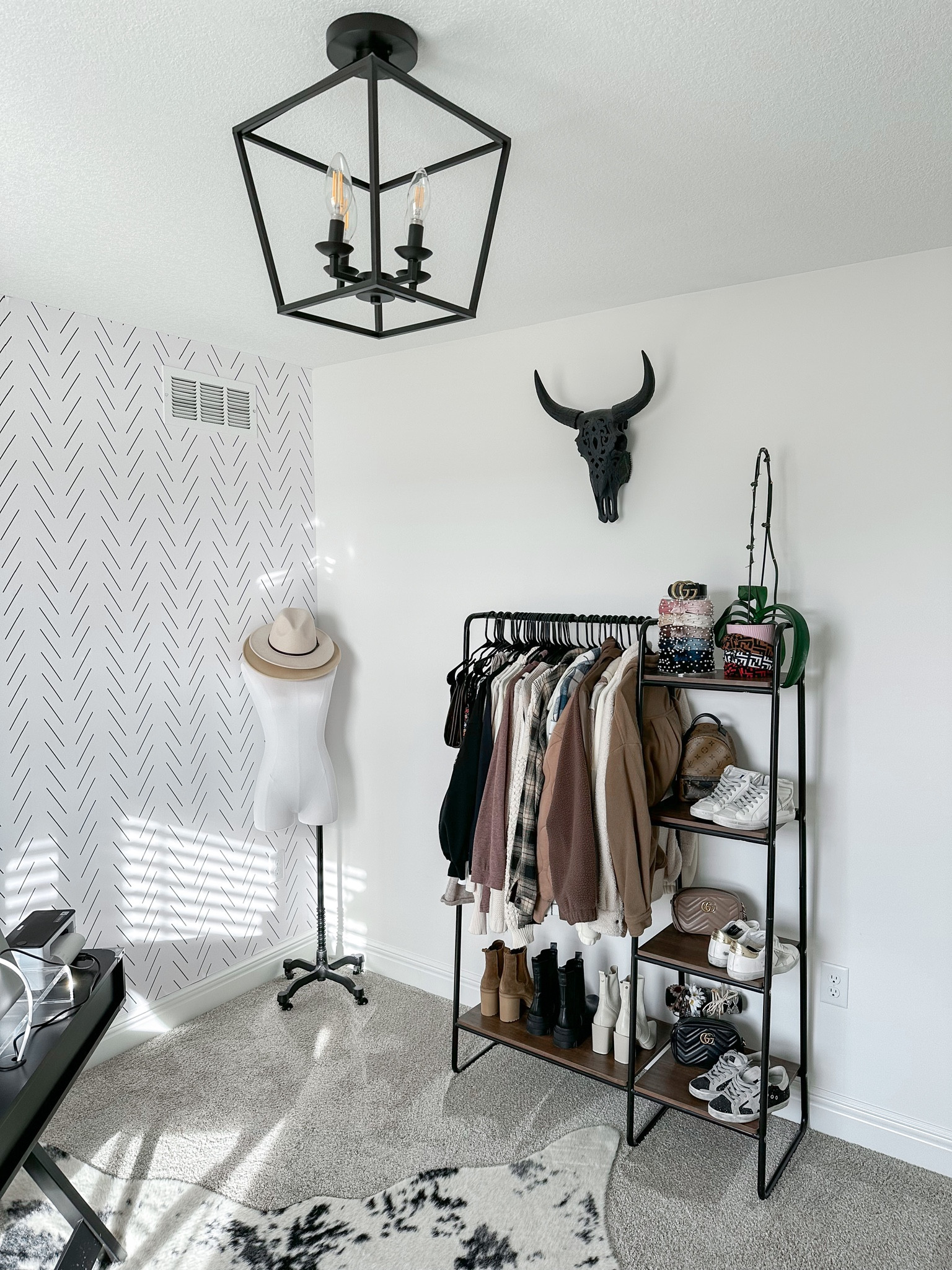 Home Office Decor 🖤

Light — bronze color 
Rug — 5’9”x7’7"

home decor | home office | cow hide rug | faux cowhide rug | cloffice inspo | clothing rack | mannequin | cow skull | rustic light | farmhouse light 

#LTKunder50 #LTKhome #LTKunder100