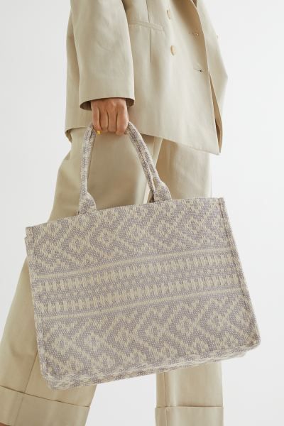 Handbag in a jacquard-weave cotton blend with two handles. Inner compartment with zipper. Lining ... | H&M (US + CA)