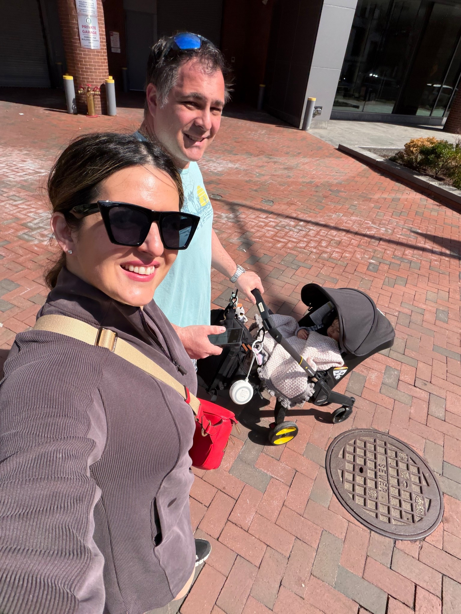 Carry less stuff! Strolling down DC with doona, my polarized sunglasses that cost less than $15 and large enough cross body bag to fit all my essentials including a diaper and wipes for a quick stroll. 

#LTKOver40 #LTKselfcare #LTKBaby