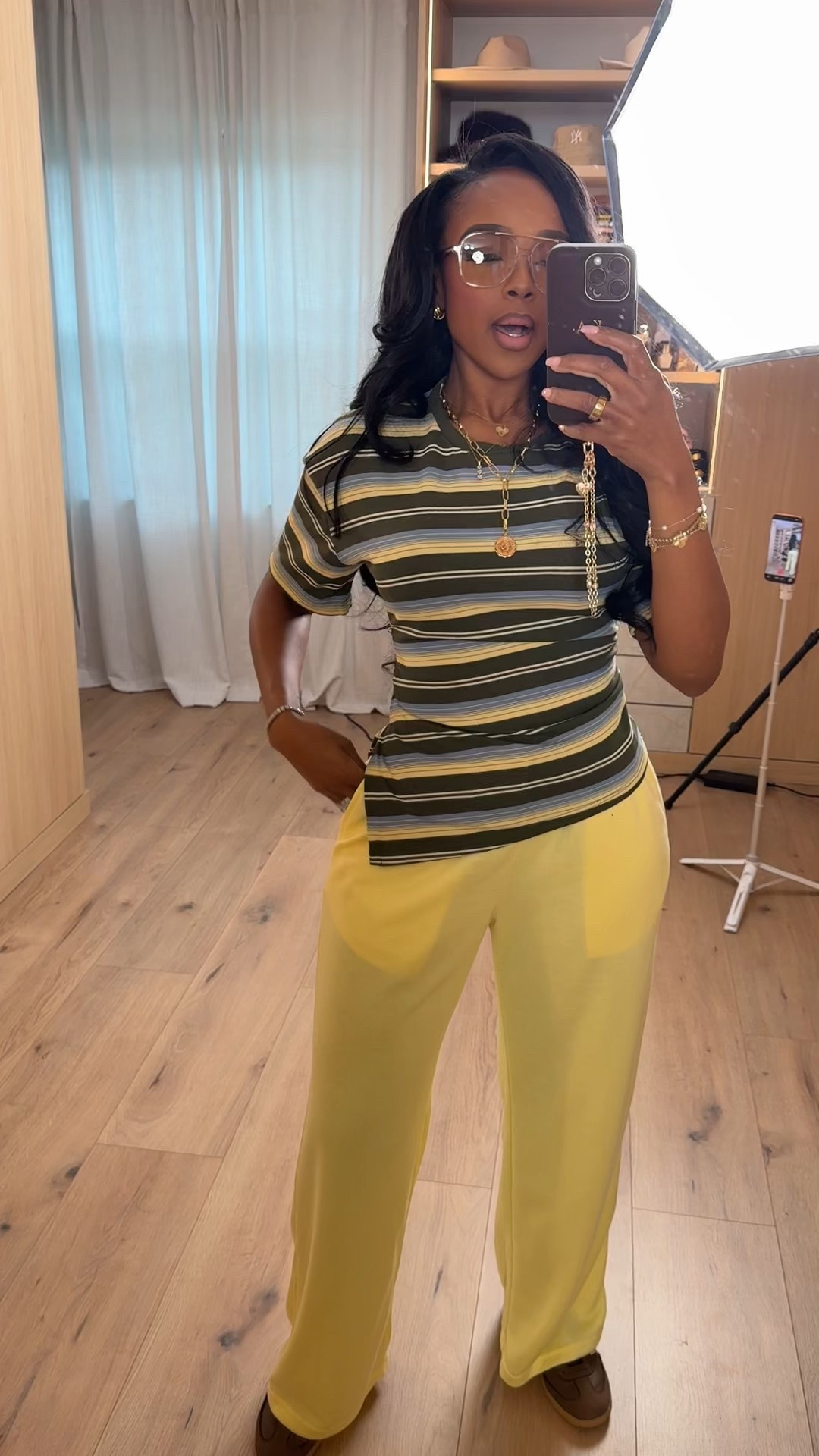 This is a fun, elevated casual look that still feels polished and intentional. The striped tee adds visual interest while the tailored trousers keep everything balanced and flattering.

This outfit is a great example of a long-term shopping strategy — each piece mixes easily with neutrals already in your closet, so the cost per wear drops fast. Swap the pants for denim or the top for a blazer and you’ve got multiple outfits from the same staples.

Perfect for casual office days, errands, brunch, travel days, or anytime you want to look put-together without feeling overdressed.

📏 Sizing:
Striped top: Size Small  
Pants: 27 Long  

📐 Measurements:
Height 5'4" | Weight 138 lbs | Bust 34D | Waist 27" | Hips 40"

Favorite this post to revisit later — this is an easy outfit formula you’ll reach for on repeat.

striped top outfit, everyday casual chic, effortless style inspiration, colorful neutral outfit, capsule wardrobe pieces, polished casual look, wearable fashion staples

Follow me on Instagram and YouTube @kirasfashionfinds