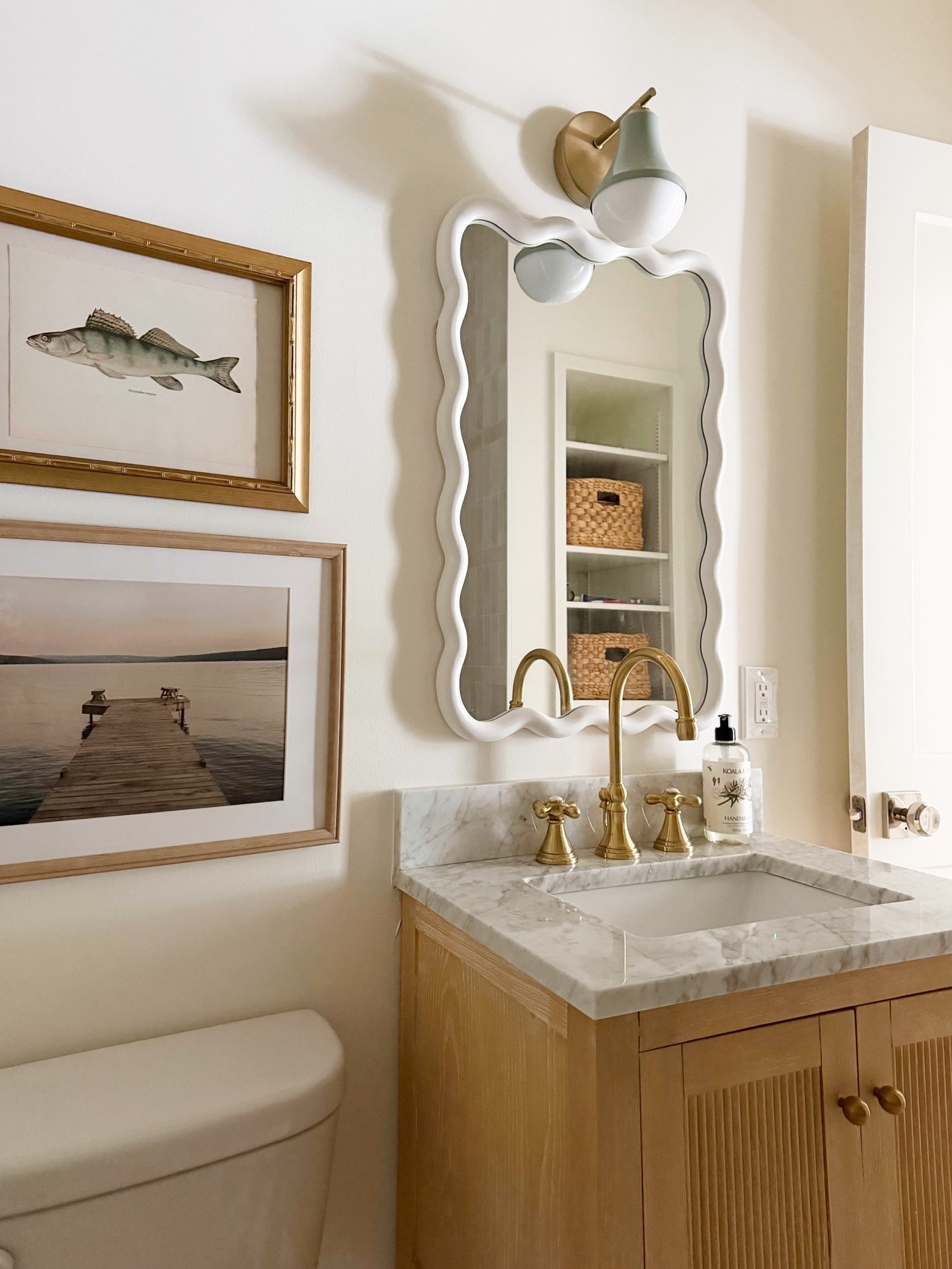 Cottage kids’ bath! Love the little vanity and tile combo! Some great affordable products in this space. 

Fish art is vintage 🐟

#LTKHome