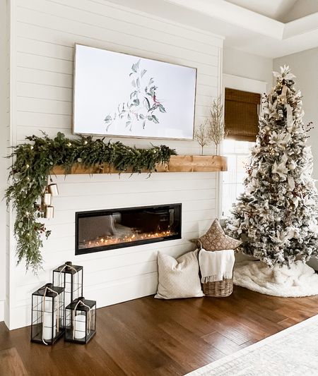 Christmas holiday bedroom tree and mantle mantel primary master bedroom modern farmhouse decor fireplace and hearth decor pillows baskets lanterns garland bells 

#LTKhome #LTKSeasonal #LTKHoliday