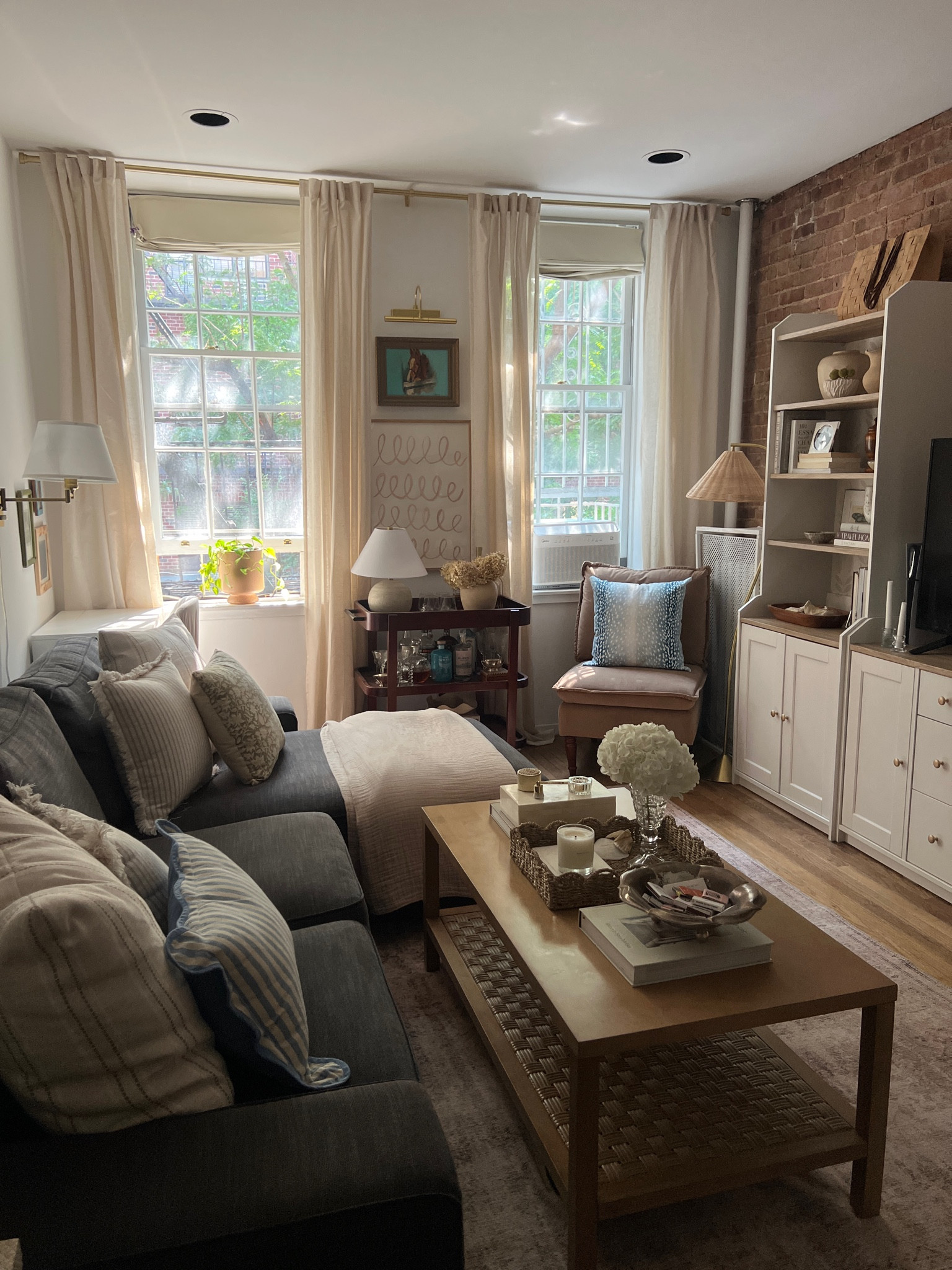 our NYC living room 🩵 #homedecor #nycapartment #apartmenttour #livingroom #livingroominspo #inspo #nancymeyersaesthetic #nancymeyers #aesthetic #nycliving 

#LTKSeasonal #LTKFindsUnder50 #LTKHome