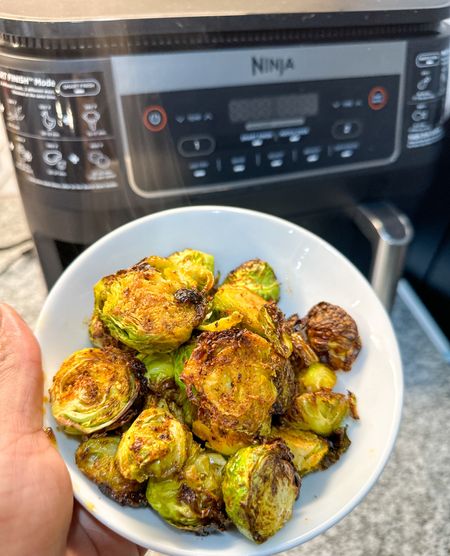 Upgraded my air fryer to this dual air fryer with 2 baskets. I absolutely love it. Can be used for so much. These Cajun brussel sprouts came out so good. #BrusselSprouts #Healthy #WellnessWednesday #AirFryerRecipes #Ninja #AirFryer #KitchenAppliances 

#LTKfitness