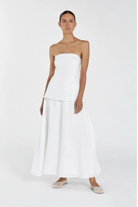 If I had a wedding event this summer I would absolutely wear this. I also saw someone wear this to their 30th outdoor birthday party and it is so chic. Love a white linen dress for summer 

.  Bridal style, bridal luncheon dress, white dress, white strapless dress, white midi dress, summer vacation dresses 

#LTKSeasonal #LTKwedding #LTKeurope