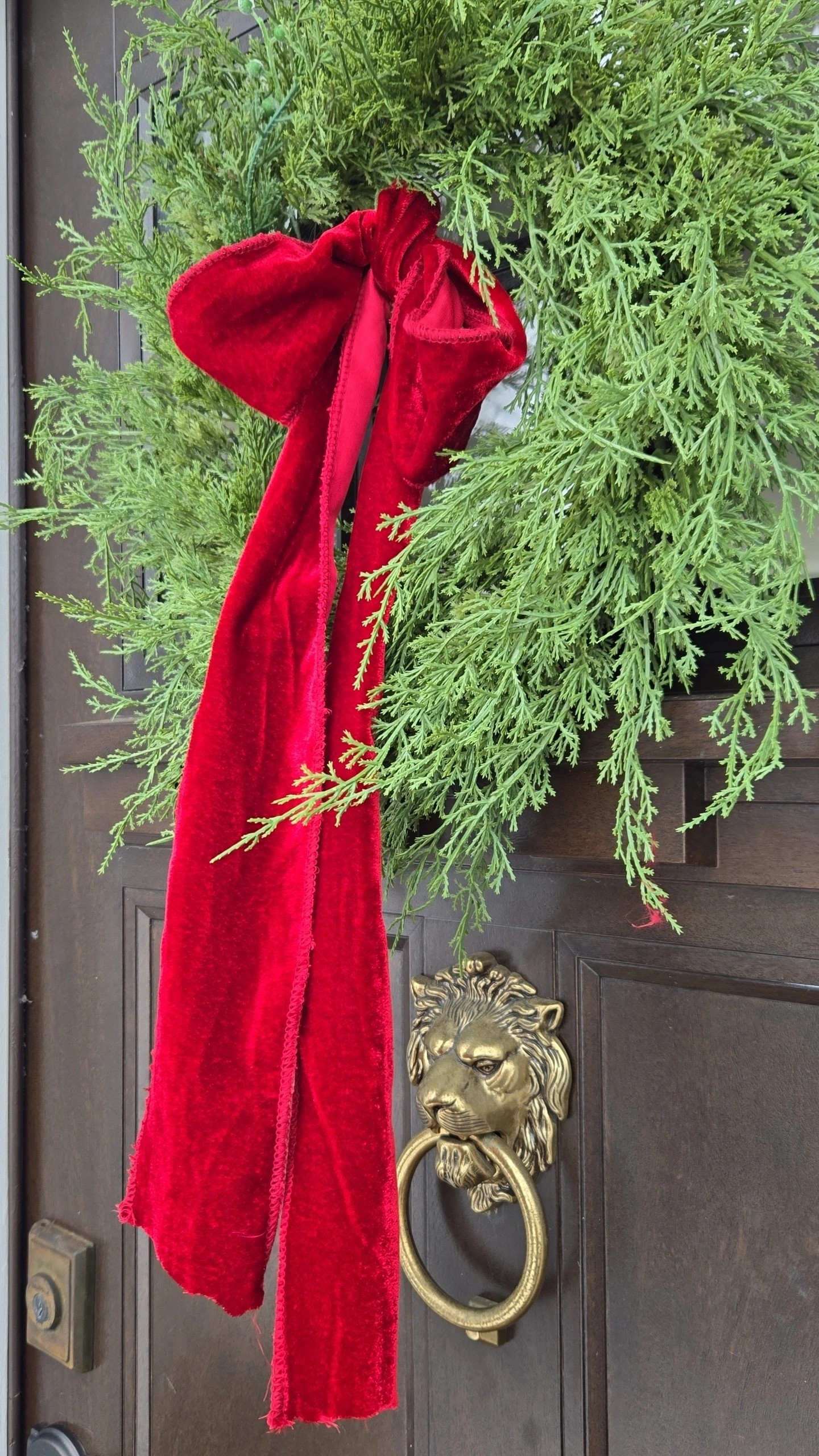 This lion door knocker is one of my favorite touches to my home. And I love this silk ribbon that I purchased from amazon. I put it on all my wreaths. Christmas, front porch, door, and tree, french, modern.

#LTKHoliday #LTKHome #LTKSaleAlert