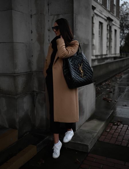 The new iCare Maxi Shopper tote black oversize leather bag from YSL teamed with a longline camel coat, black trousers, oversized jumper and some white trainers for a simple yet chic autumn / winter outfit. #ysl #yslicare #yslbag #saintlaurent #autumnoutfit #ootd #winteroutfit #casualoutfit #casuallook #totebag

#LTKeurope #LTKstyletip #LTKSeasonal