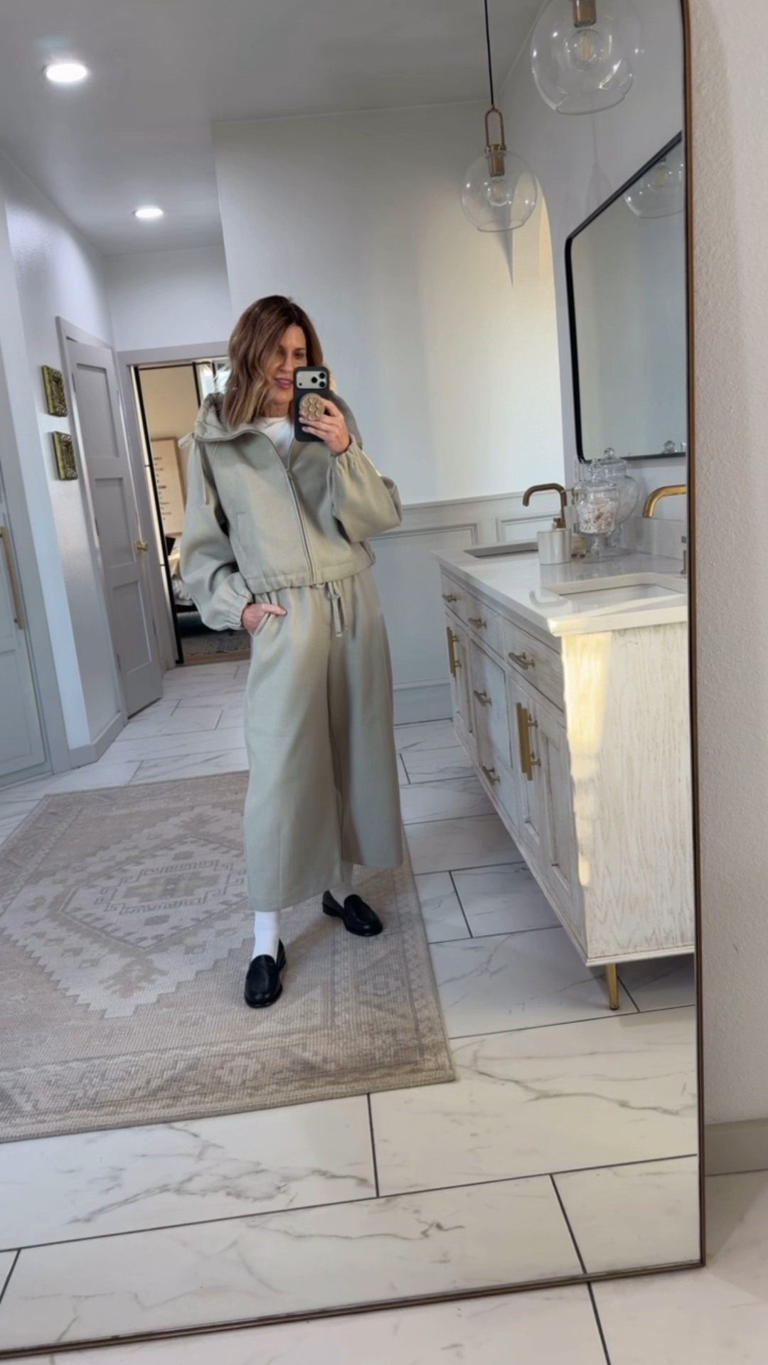 This set is giving me 90s JNCO vibes with the huge pockets! I wasn’t cool enough 30+ years ago to pull off, so I’m going to pass once again on this look which I truly think is cute for other people! Wearing a size medium and may have kept in a smaller size small