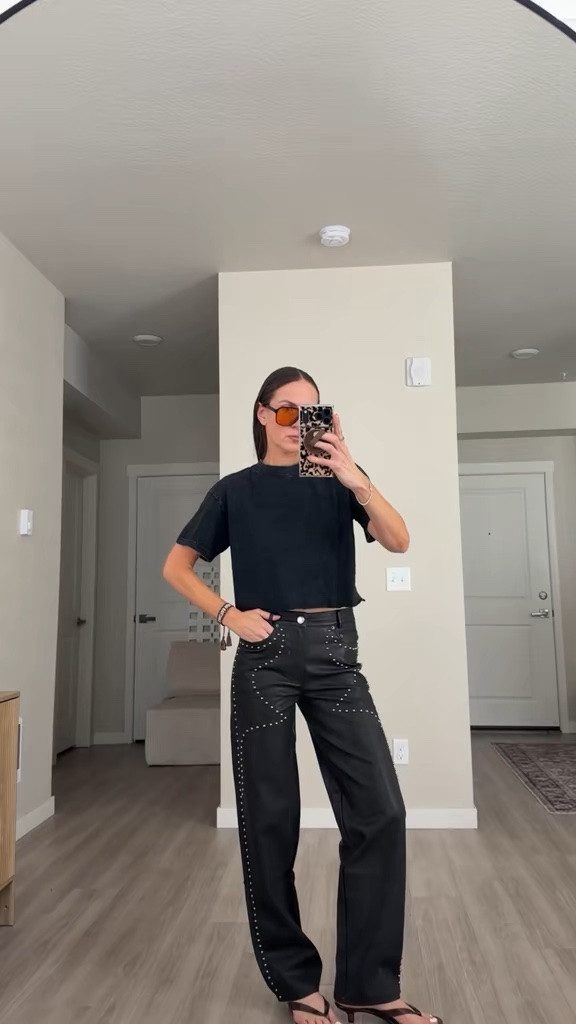 Wearing size small ( 4 in pants) 
Black faux leather pants 
#tiktok #fauxleatherpants #studdedpants