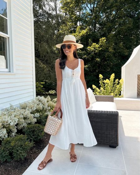 Kat Jamieson of With Love From Kat wears a white dress. Midi dress, tan sandals, neutral handbag, neutral hat, sunglasses. 

#LTKstyletip #LTKSeasonal