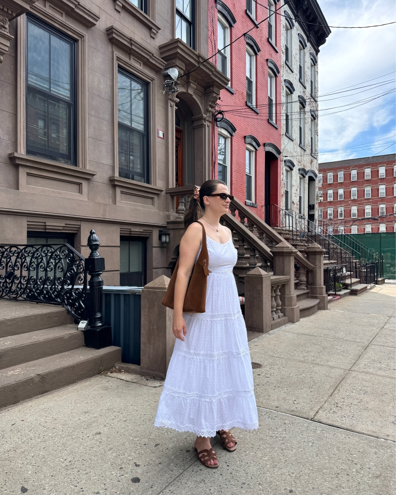 A simple white eyelet sundress is the perfect summer outfit. I paired this look with my suede bag from Coach and a big scrunchie. The flat sandals could be swapped for sneakers if you’re running errands.

#LTKootd